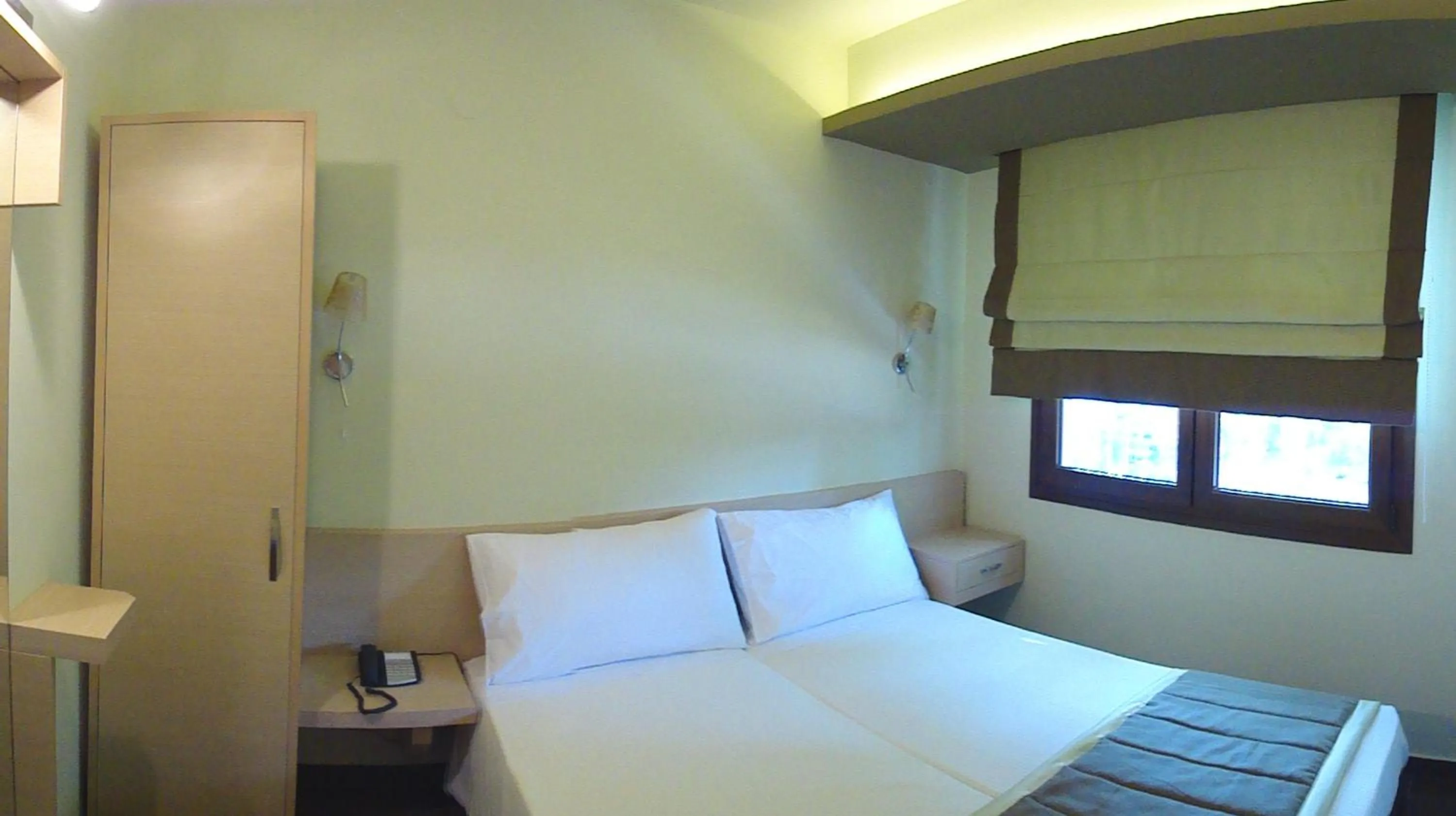 Bed in Hotel Ifigenia