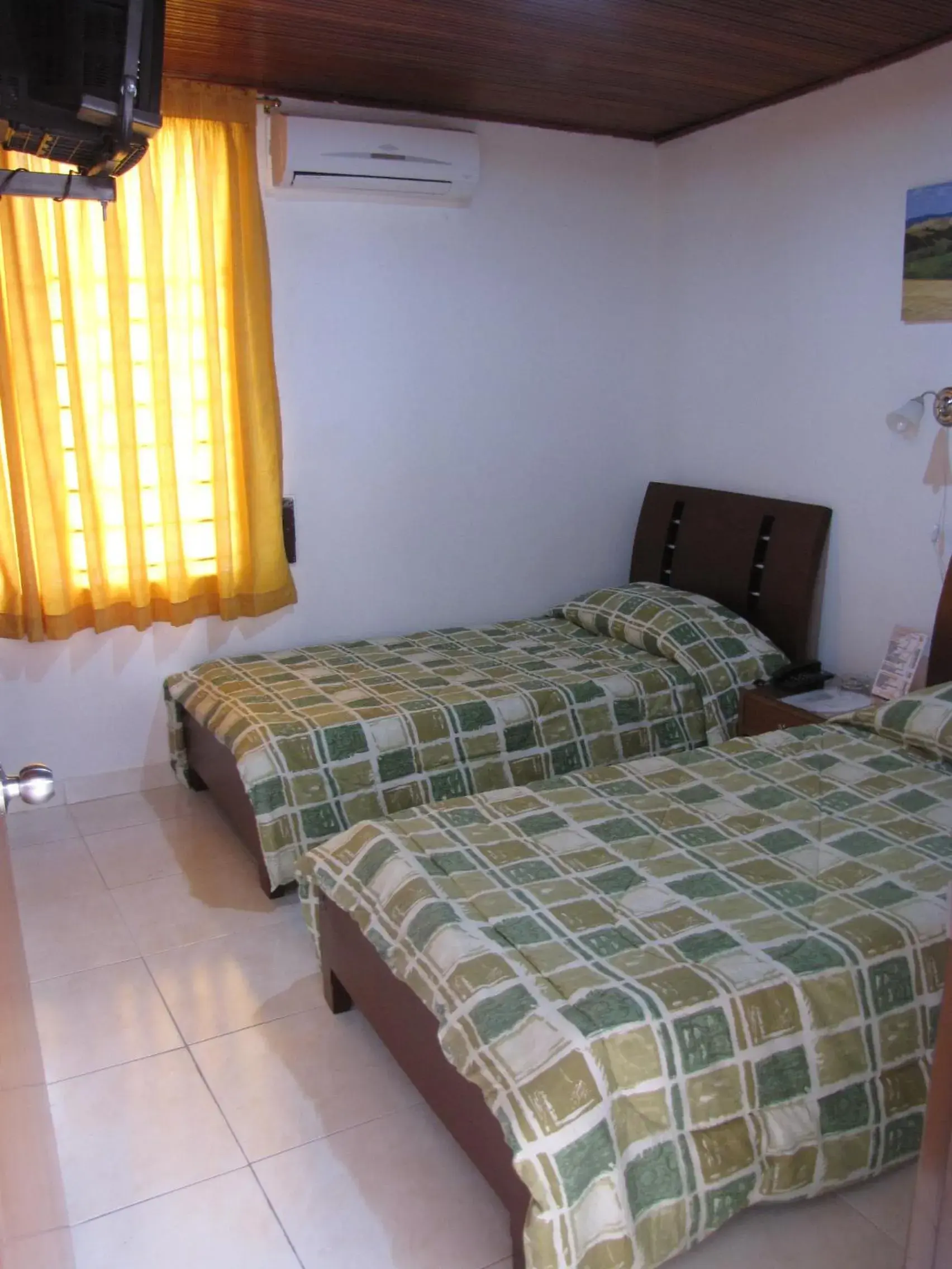 Standard Triple Room in Hotel Villa Real de Cucuta Standard Triple Room in Hotel Villa Real de Cucuta