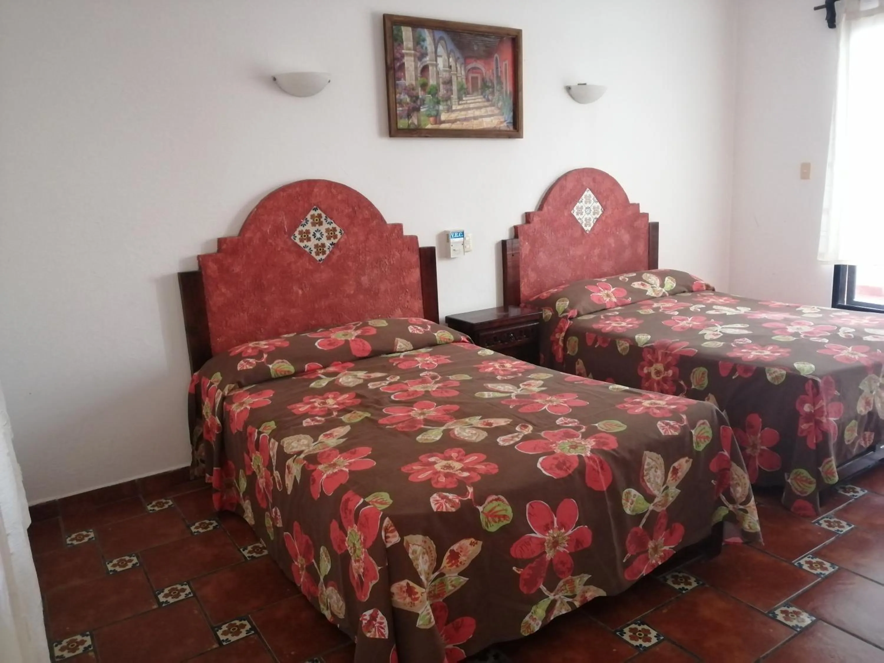 Bed in Hotel Villa Palmeras