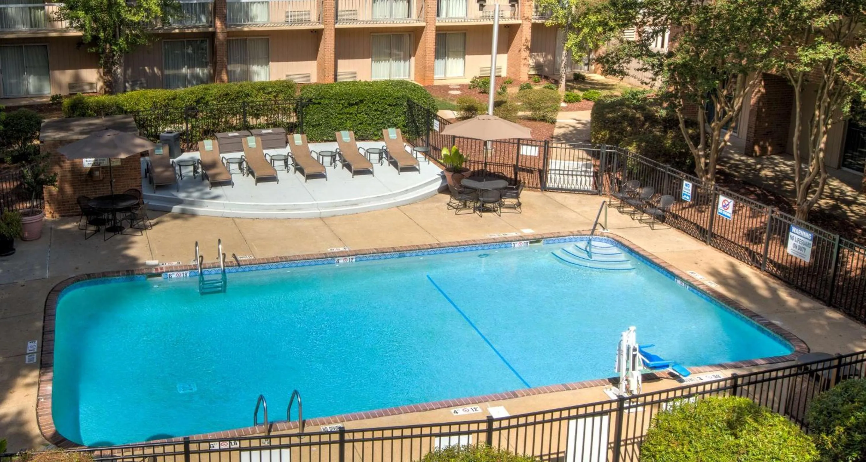 On site, Pool View in SureStay Plus Hotel by Best Western Raleigh North Downtown