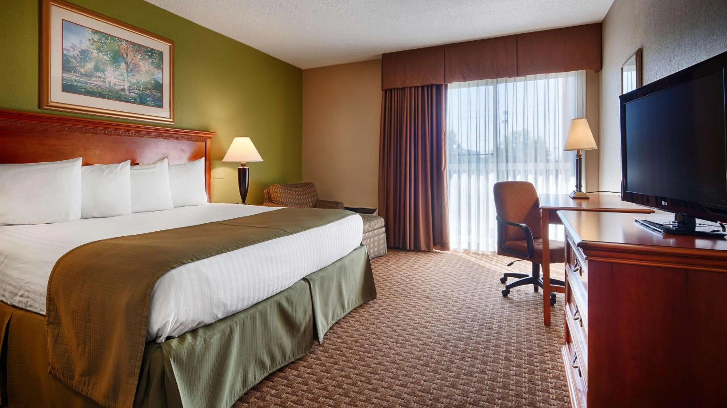 Photo of the whole room in SureStay Plus Hotel by Best Western Raleigh North Downtown