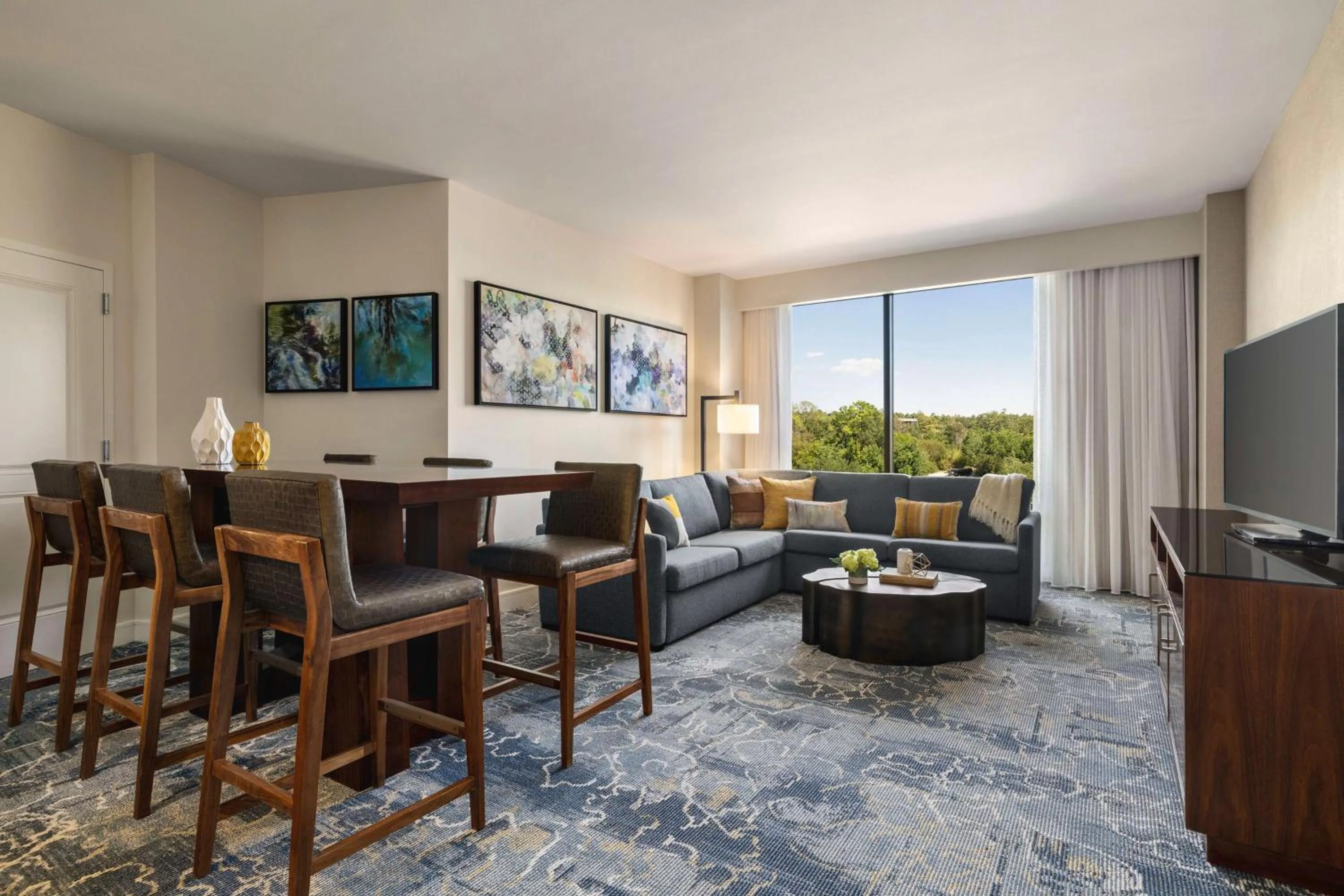 Living room in The Woodlands Resort, Curio Collection by Hilton