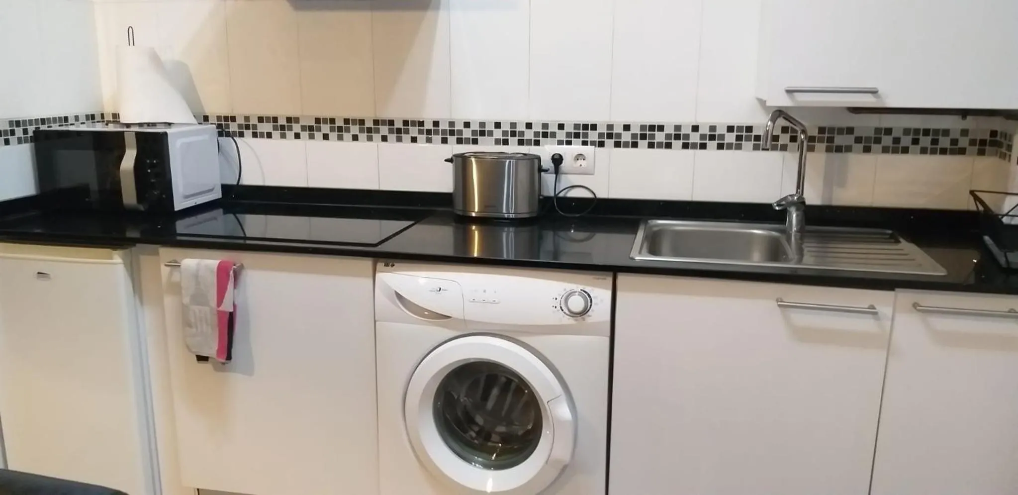 Kitchen or kitchenette in Apartamentos Nájera