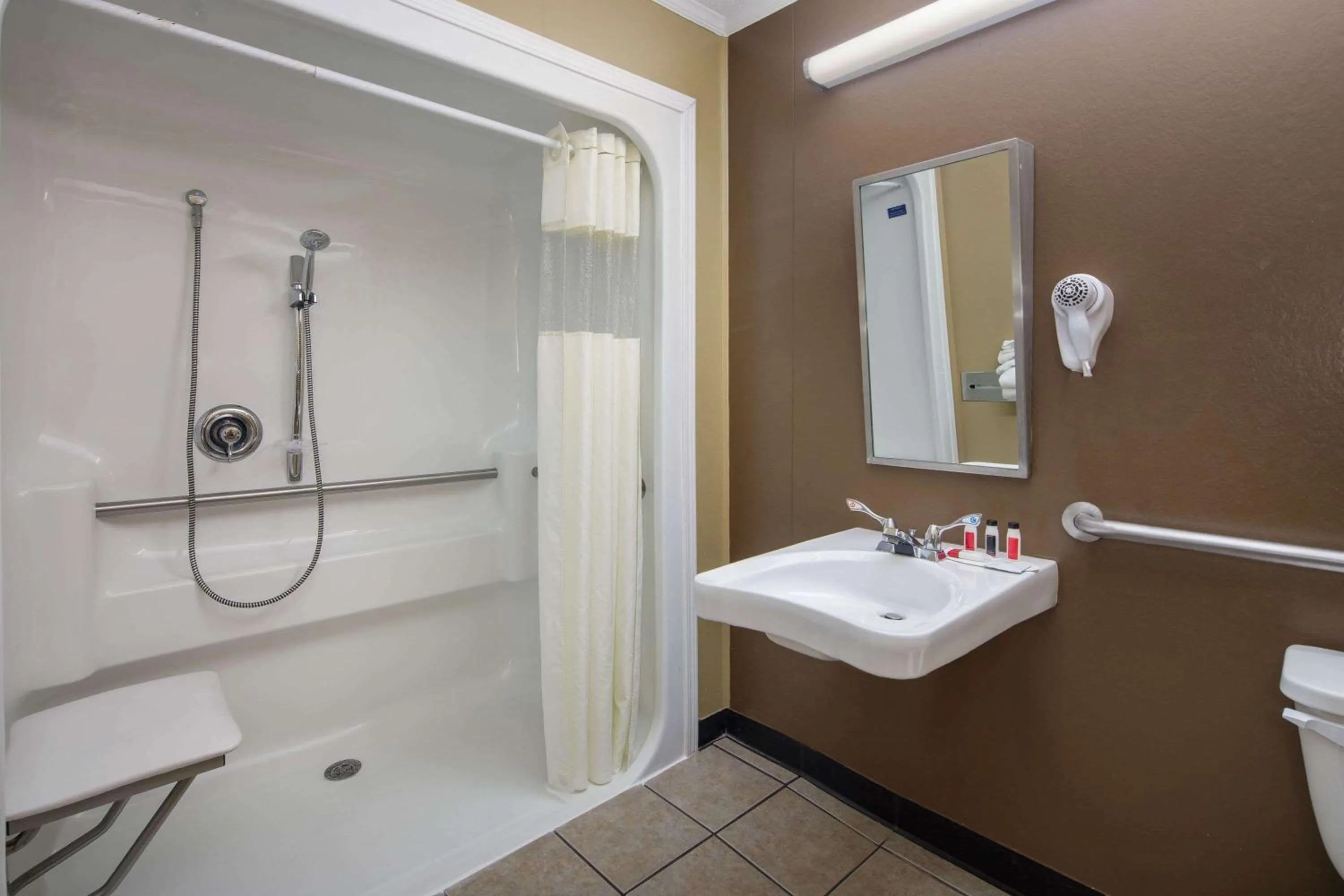 Shower in Microtel Inn & Suites by Wyndham Columbia Fort Jackson N