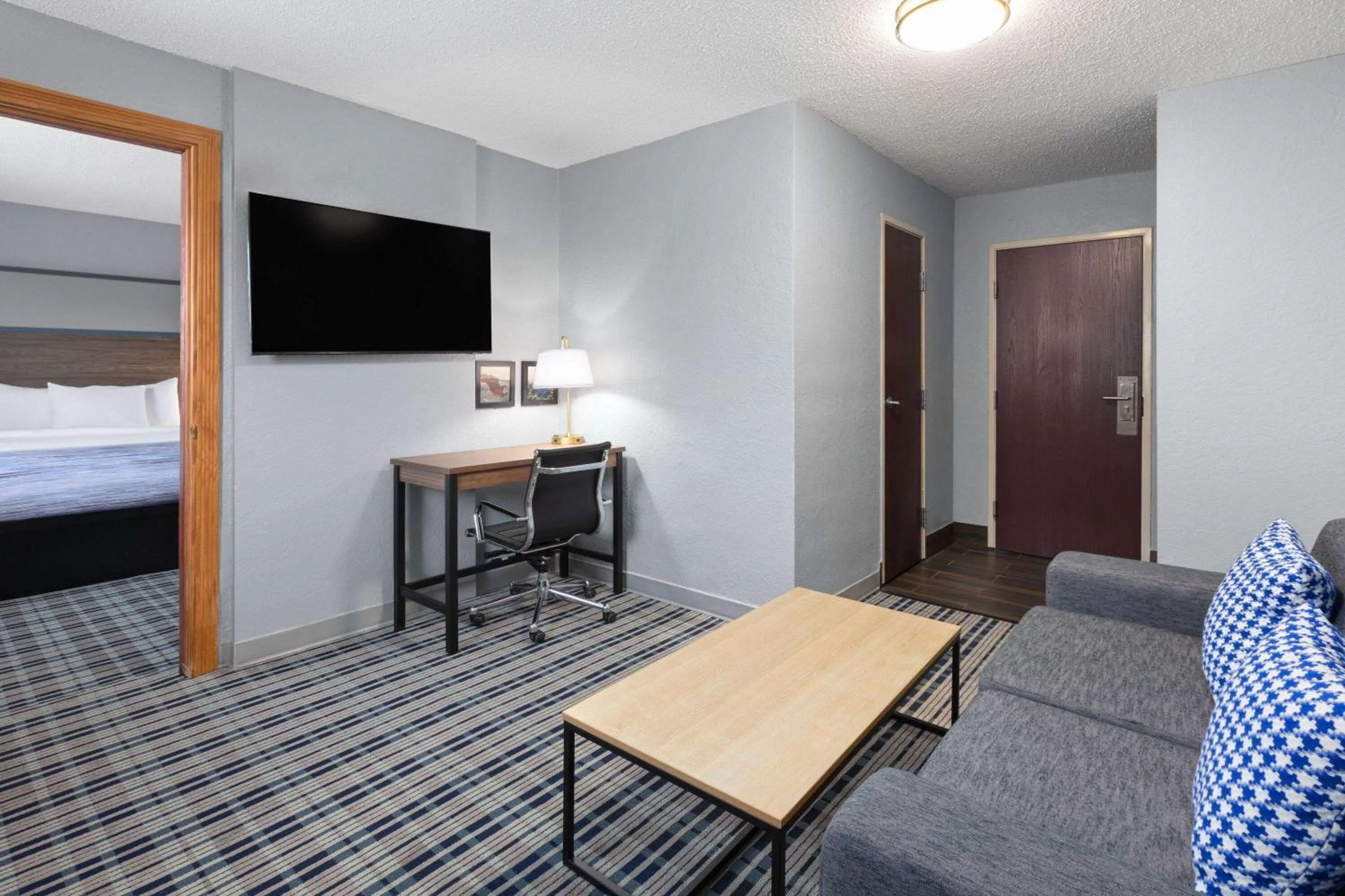 Photo of the whole room, Bed in AmericInn by Wyndham Grinnell