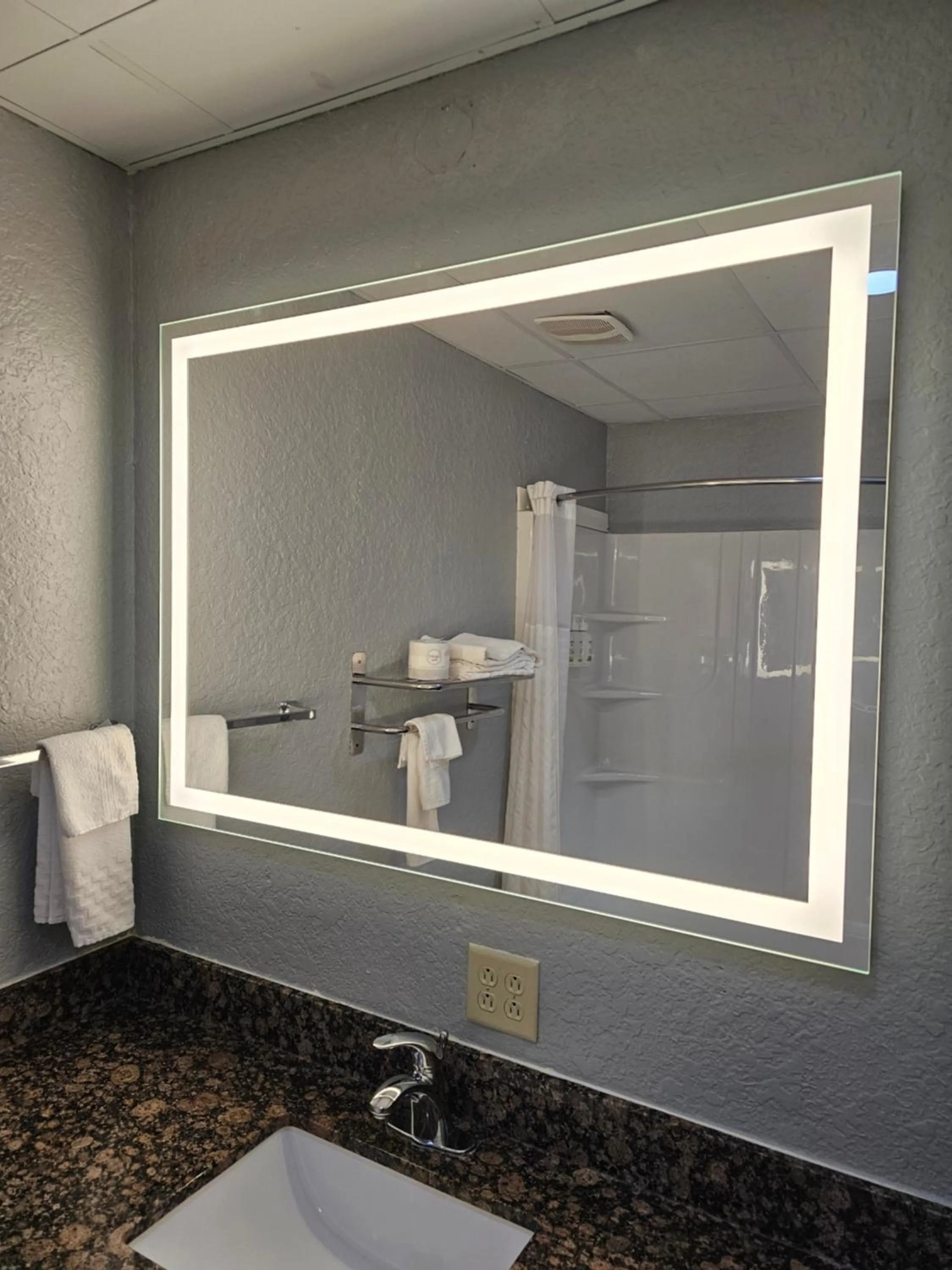 Bathroom in AmericInn by Wyndham Grinnell