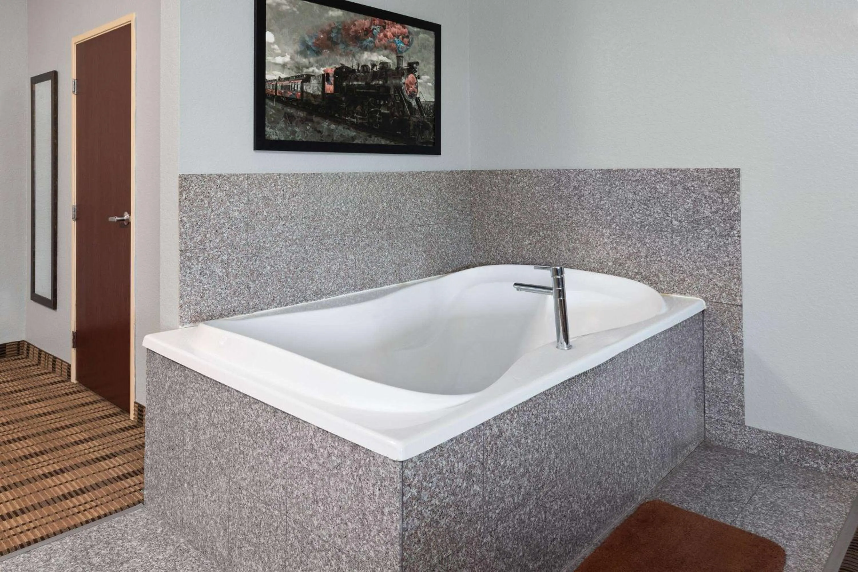 Bath in AmericInn by Wyndham Grinnell