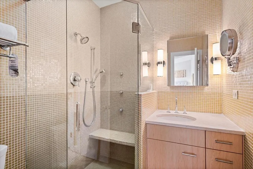 Shower in Independence Square 304, Stylish Hotel Room with Downtown Views & Great Location