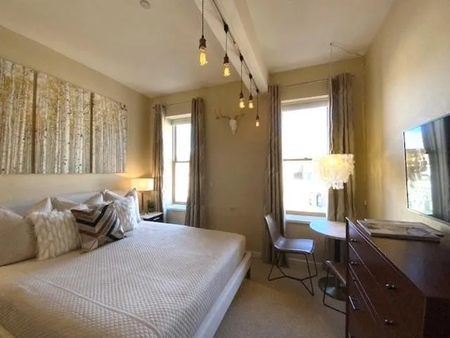 Bed in Independence Square 304, Stylish Hotel Room with Downtown Views & Great Location