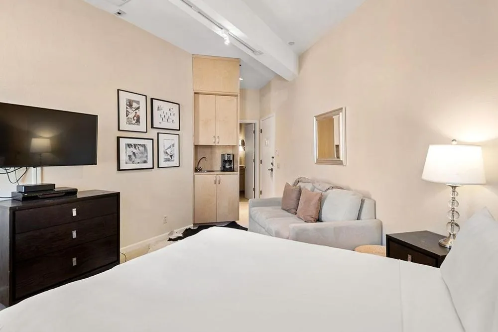 Photo of the whole room, Bed in Independence Square 304, Stylish Hotel Room with Downtown Views & Great Location