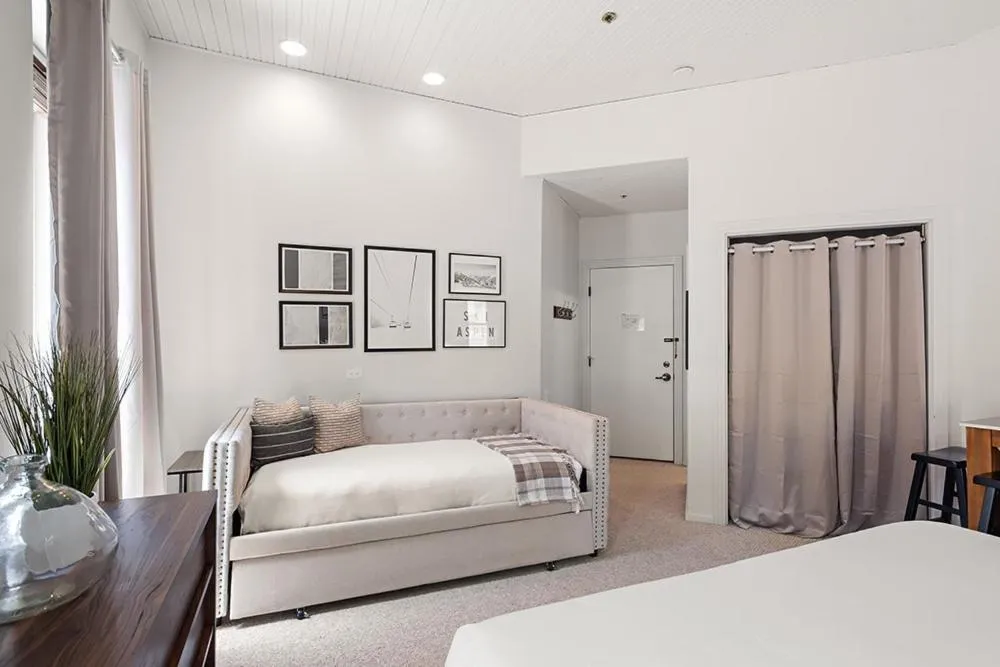 Bedroom, Bed in Independence Square 211, Chic Hotel Room with Mountain Views, A/C, & Rooftop Hot Tub