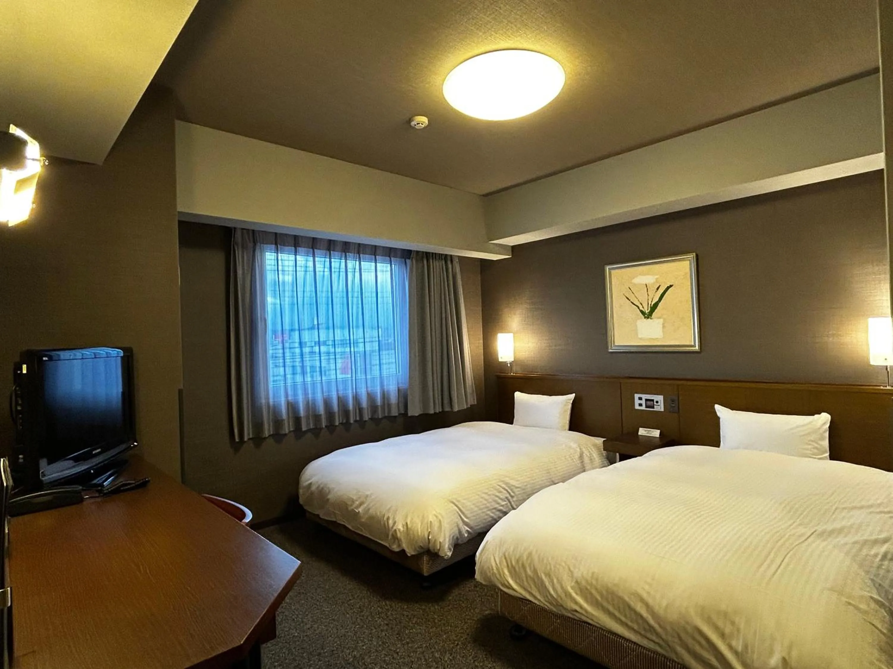 Photo of the whole room, Bed in Hotel Route-Inn Marugame
