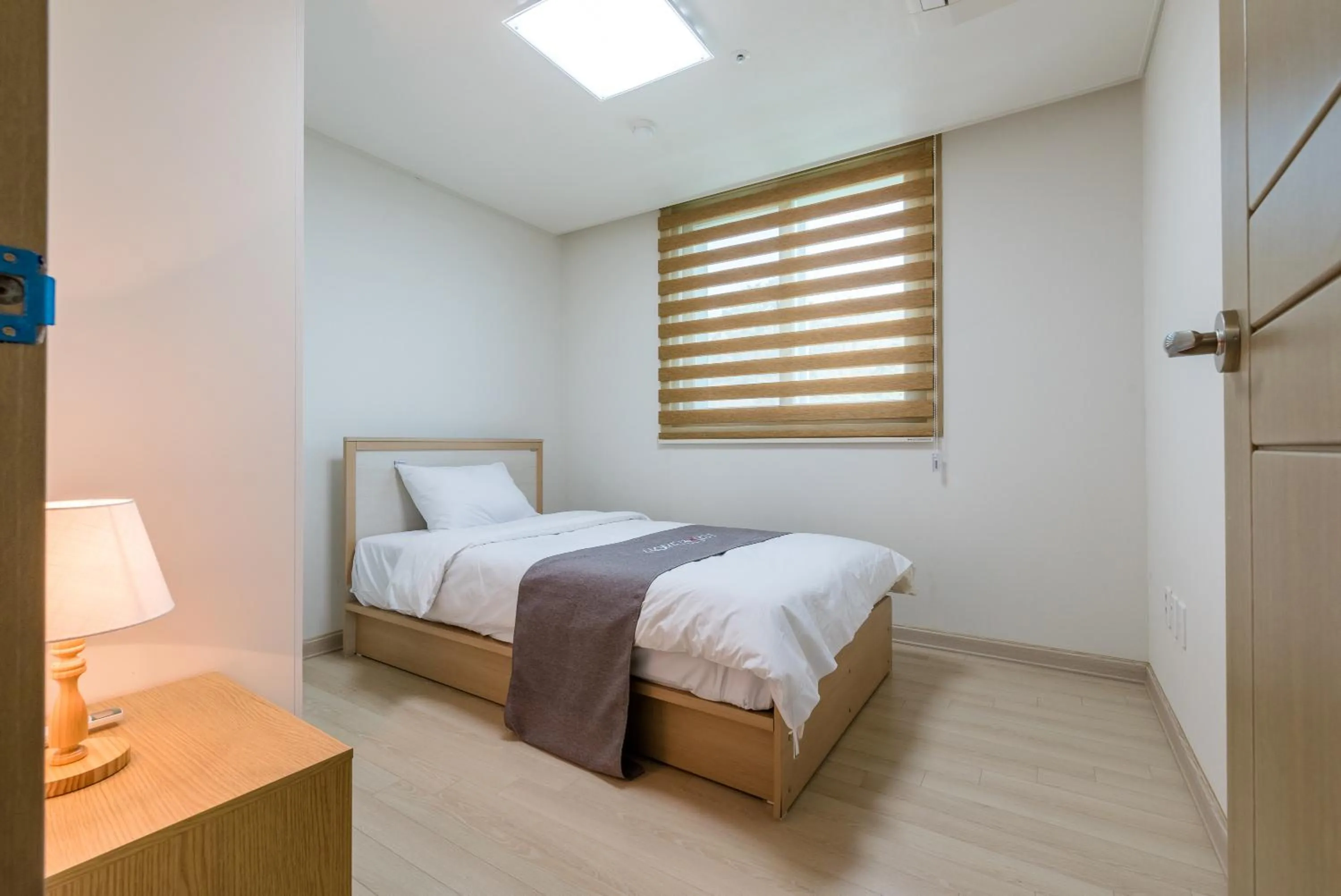 Bed in Home Fourest Residence Hotel Okpo