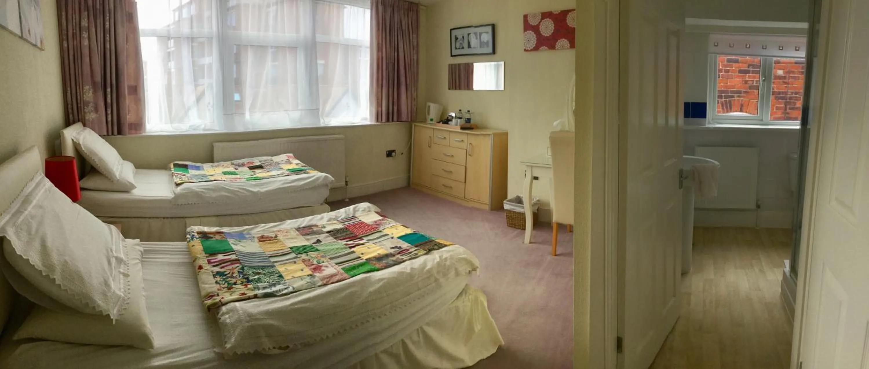 Bed in The Swallow Hotel