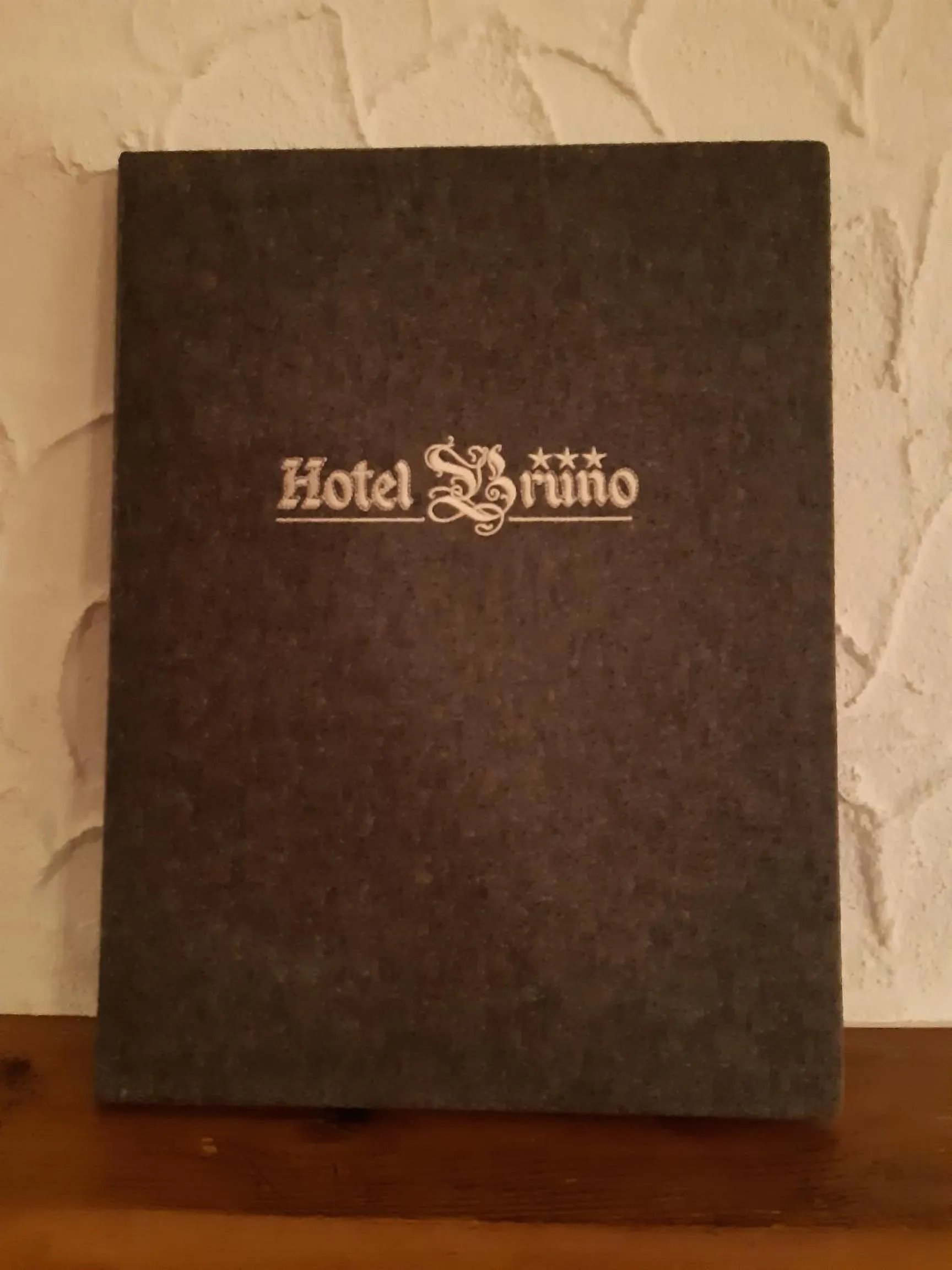 Property logo or sign in Hotel Bruno