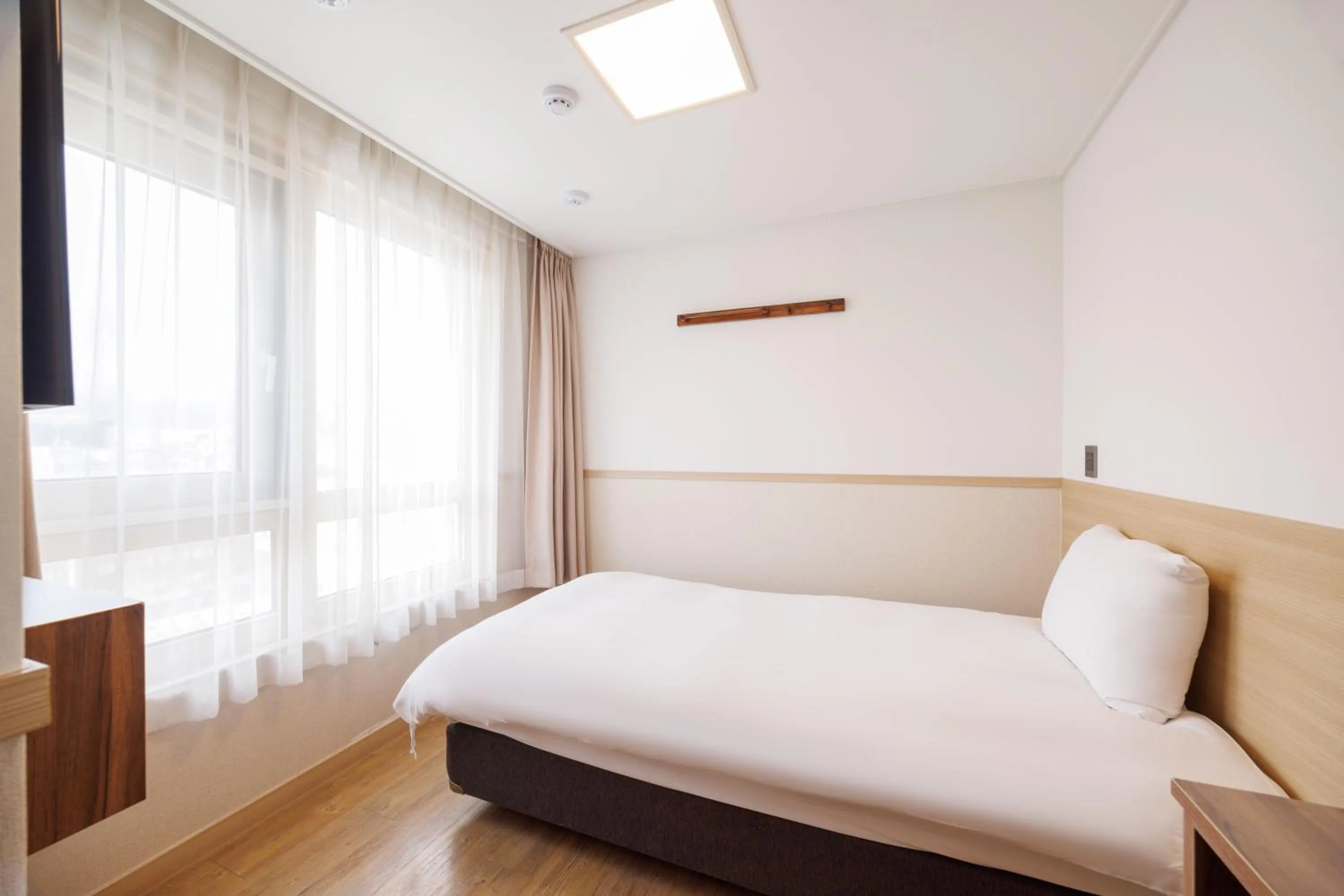 Bedroom, Bed in Kenny Stay Jeju Seogwipo