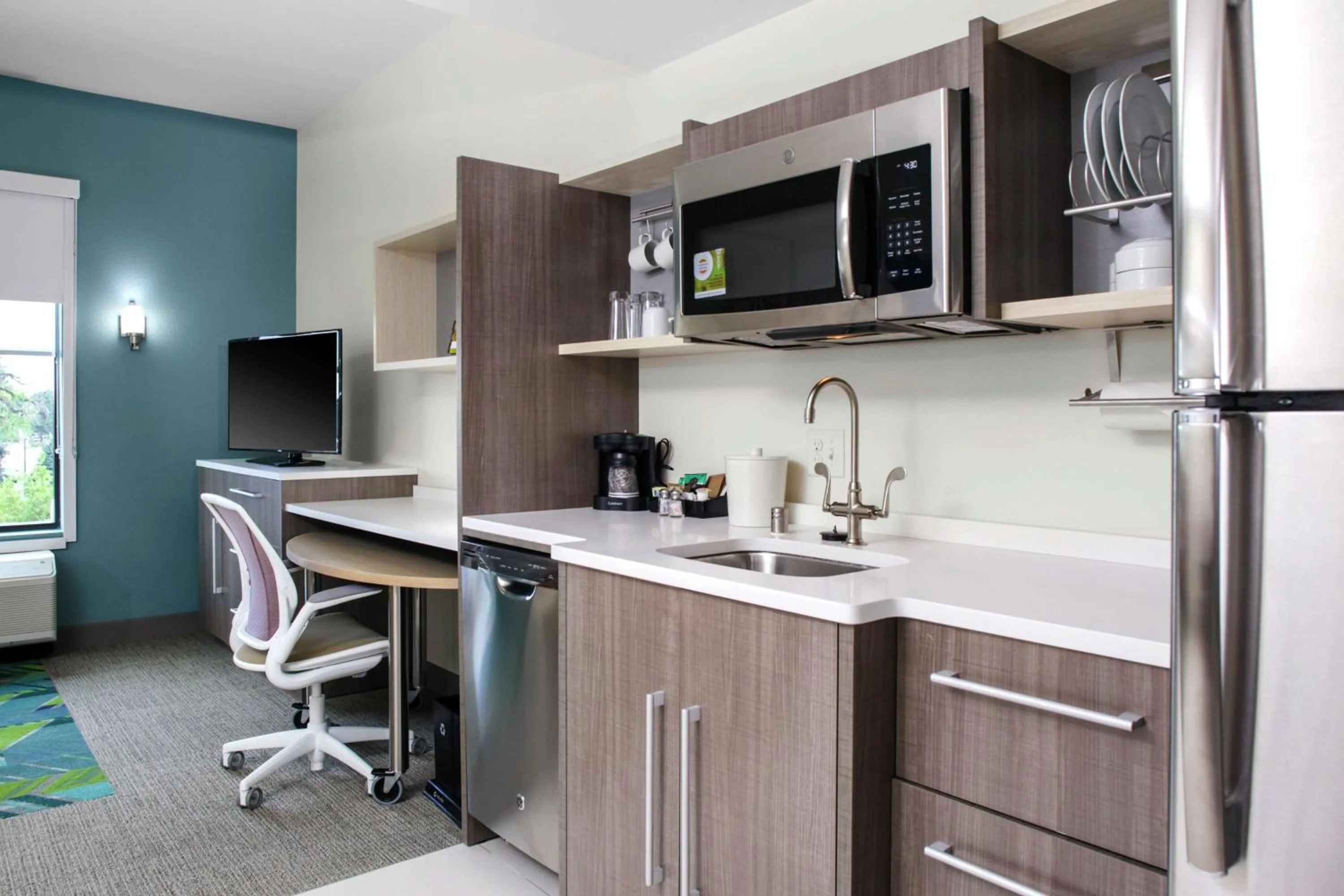 Kitchen or kitchenette in Home2 Suites By Hilton Fort Collins