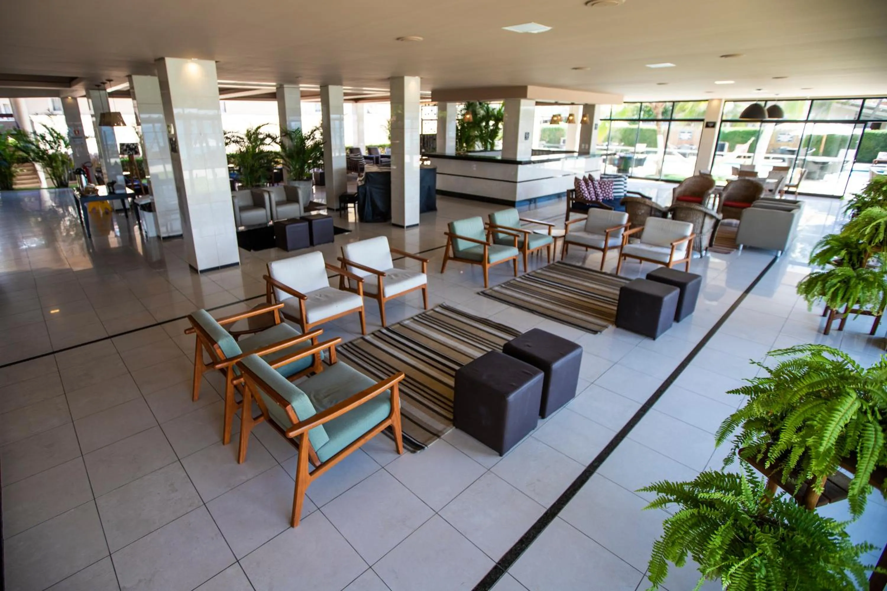 Communal lounge/ TV room in Village Barra Hotel