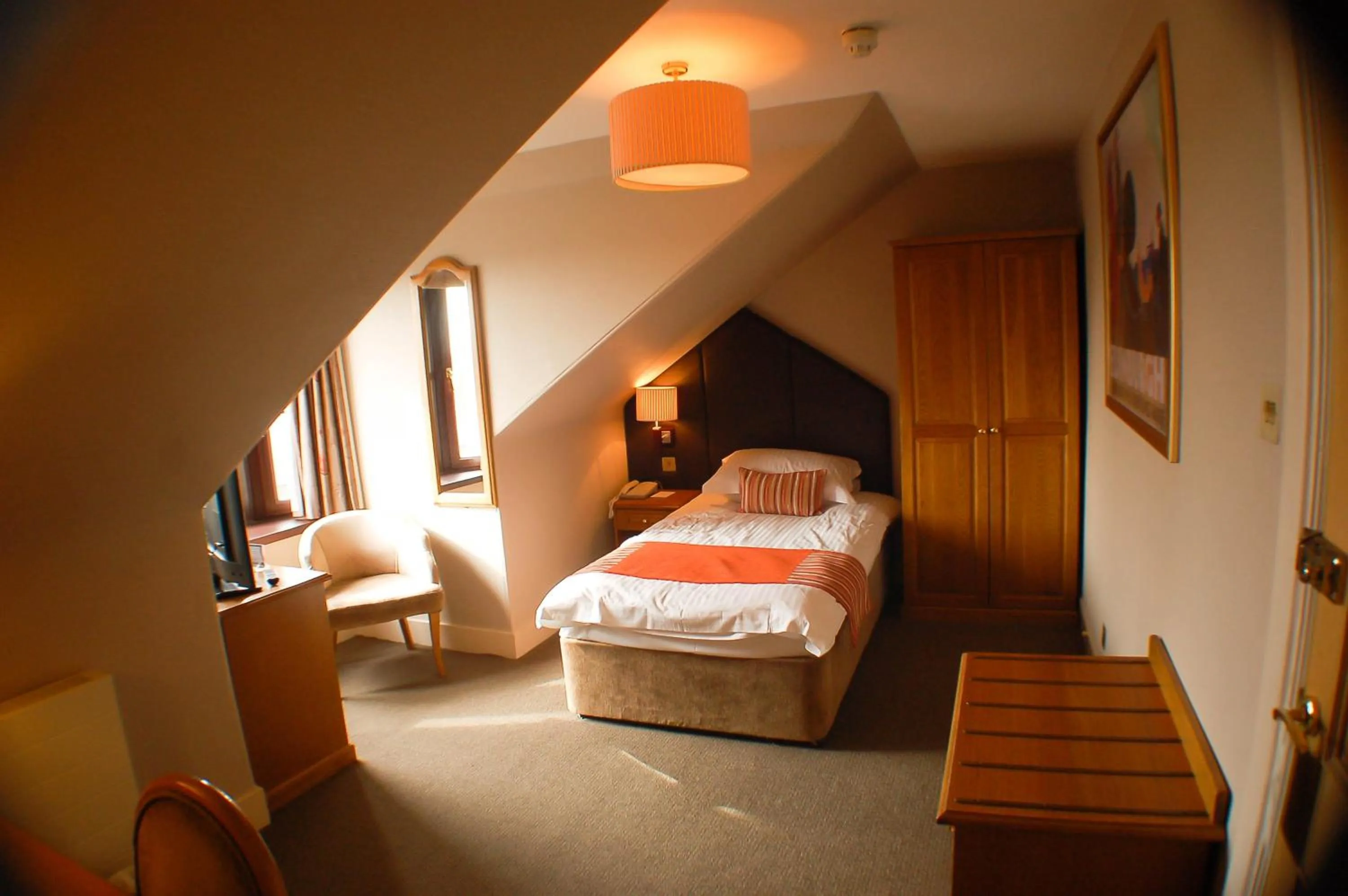 Bed in The Dutch Mill Hotel