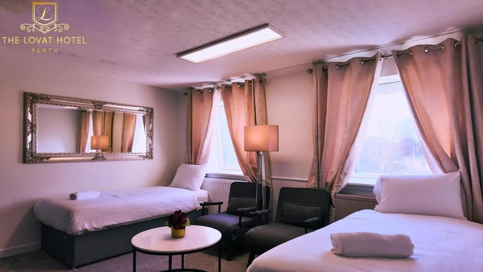 Quadruple Room with Sofa Bed in Lovat Hotel