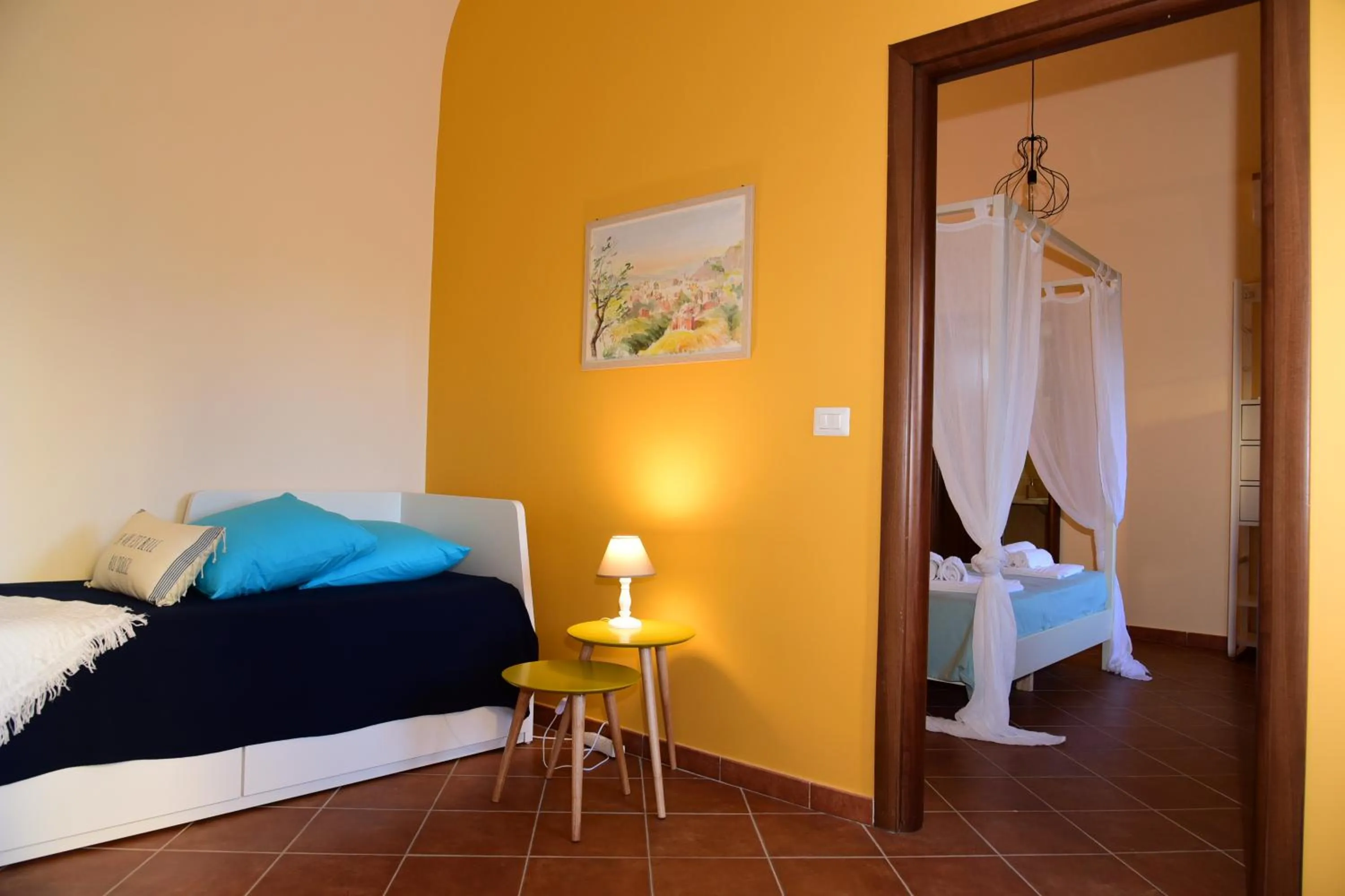 Seating area, Bed in Giardino Arancio