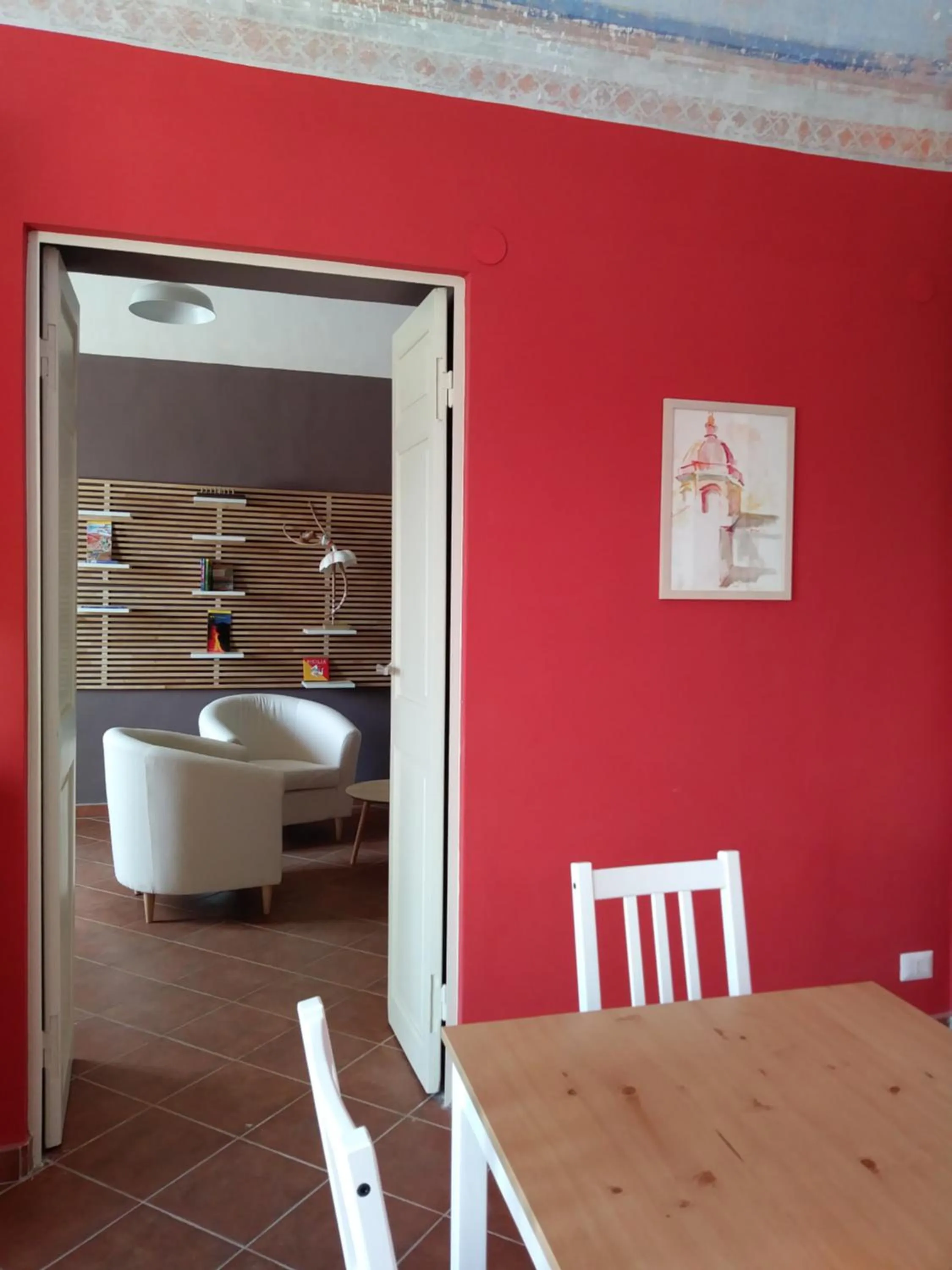 Communal lounge/ TV room in Giardino Arancio