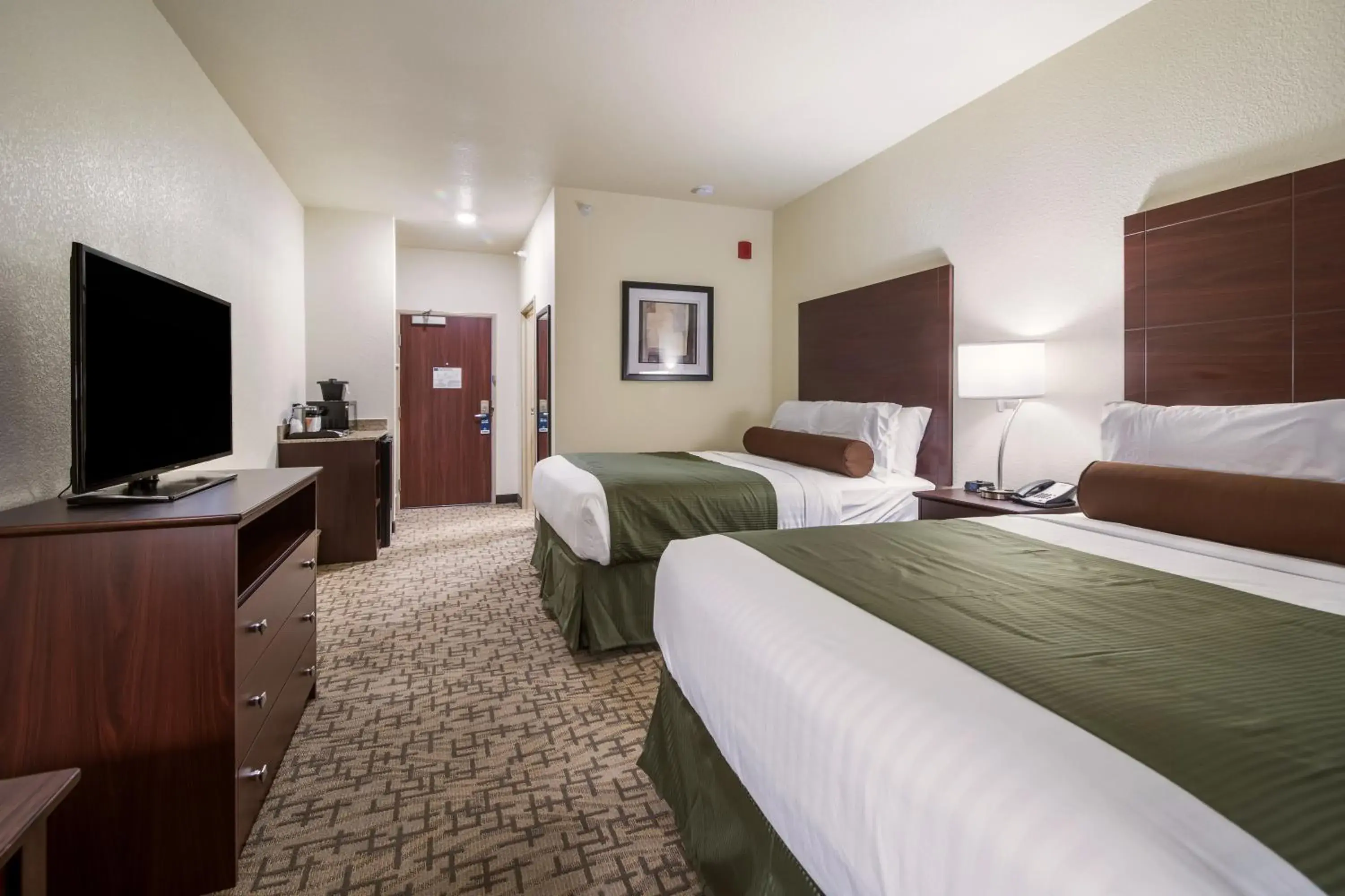 Bed in Cobblestone Hotel & Suites - Victor Bed in Cobblestone Hotel & Suites - Victor