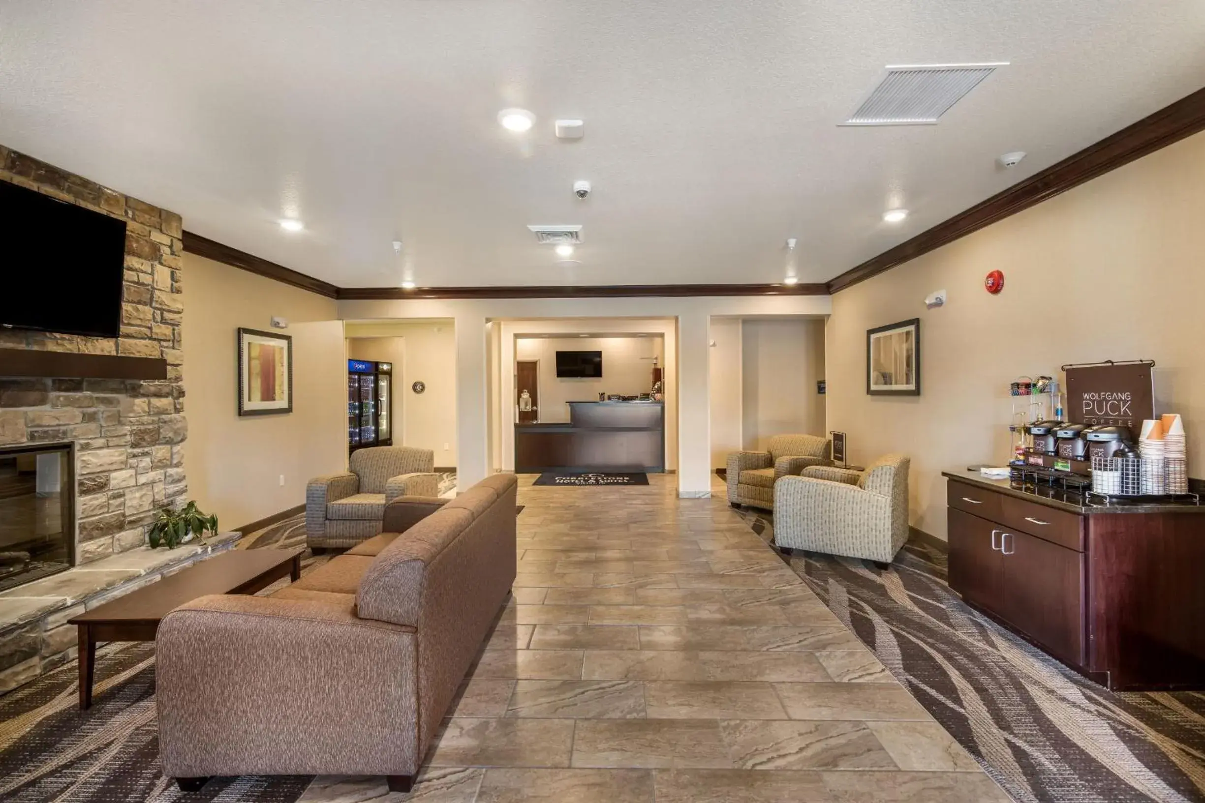 Lobby or reception in Cobblestone Hotel & Suites - Victor Lobby or reception in Cobblestone Hotel & Suites - Victor