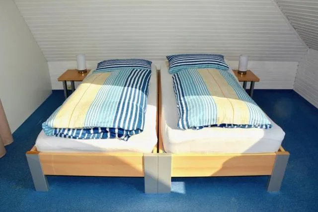 Bed in Gaestehaus Kiekmolrin