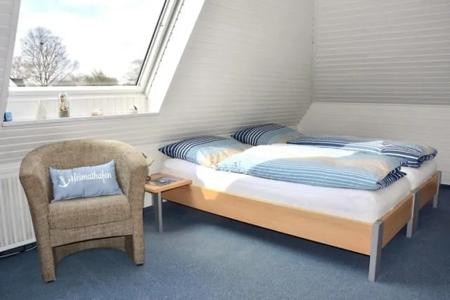 Bed in Gaestehaus Kiekmolrin