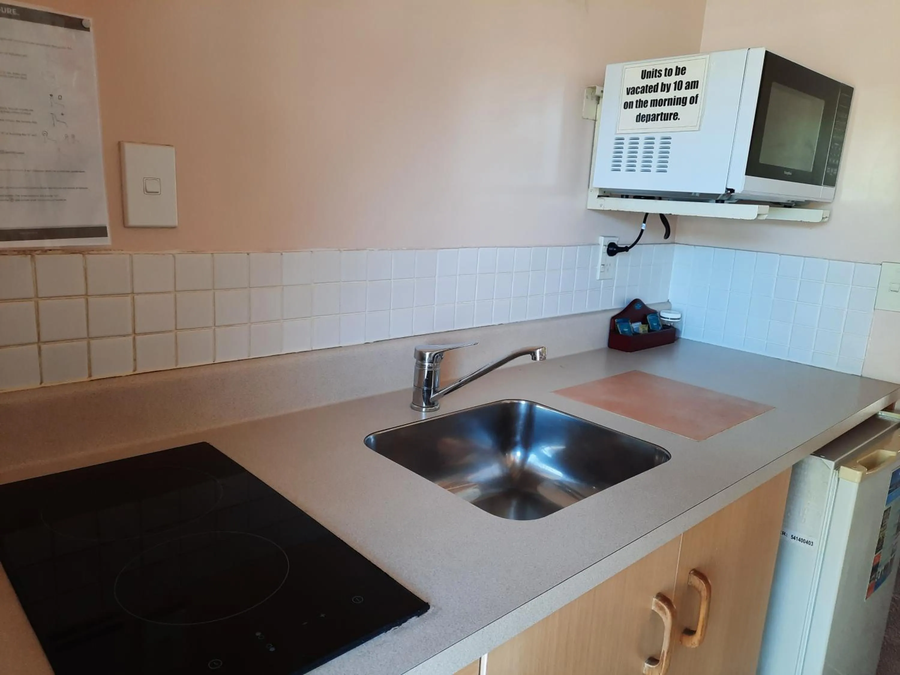 Kitchen or kitchenette in Alfa Boutique Motel