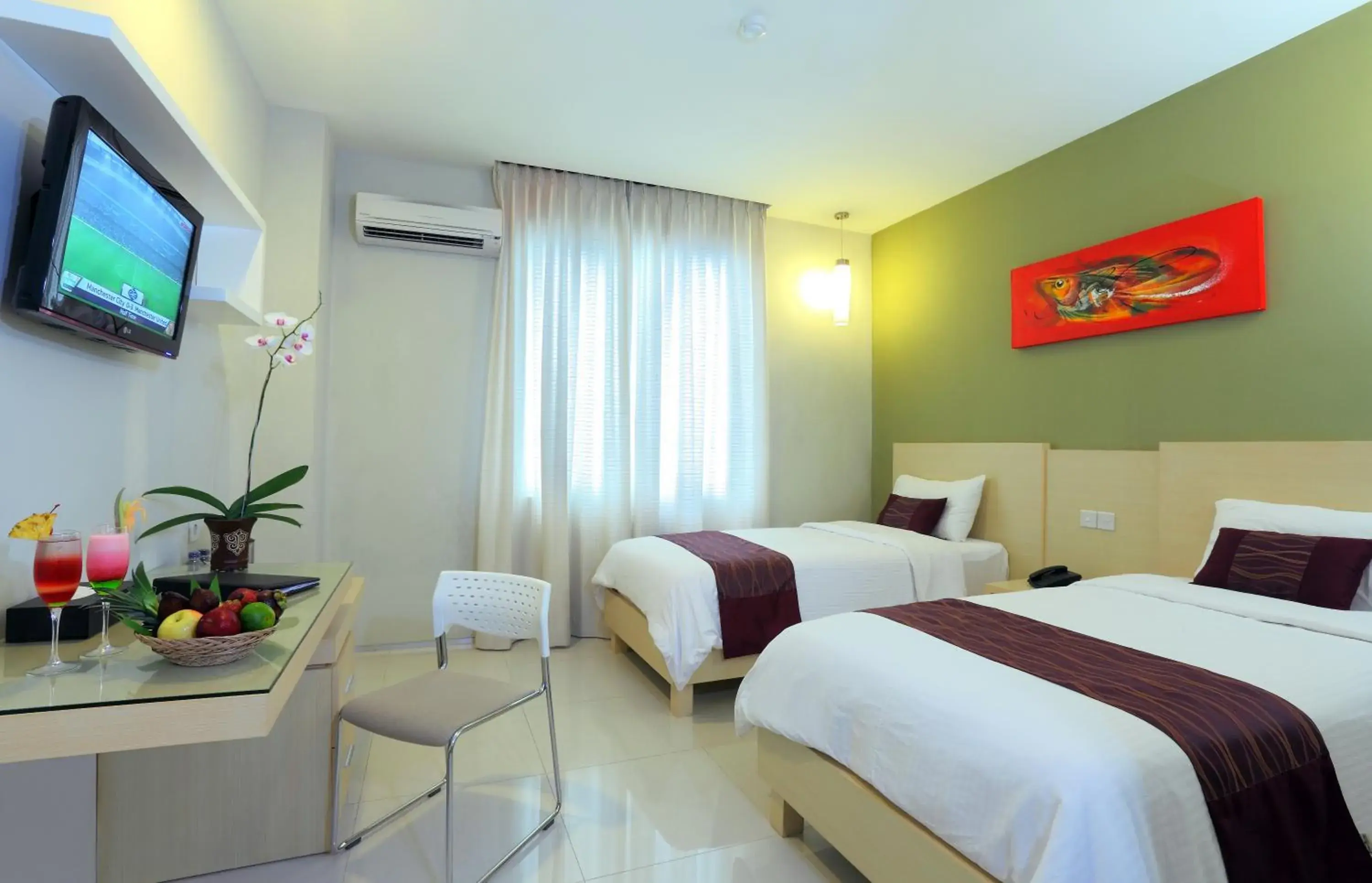 TV and multimedia, Bed in Lombok Plaza Hotel and Convention TV and multimedia, Bed in Lombok Plaza Hotel and Convention