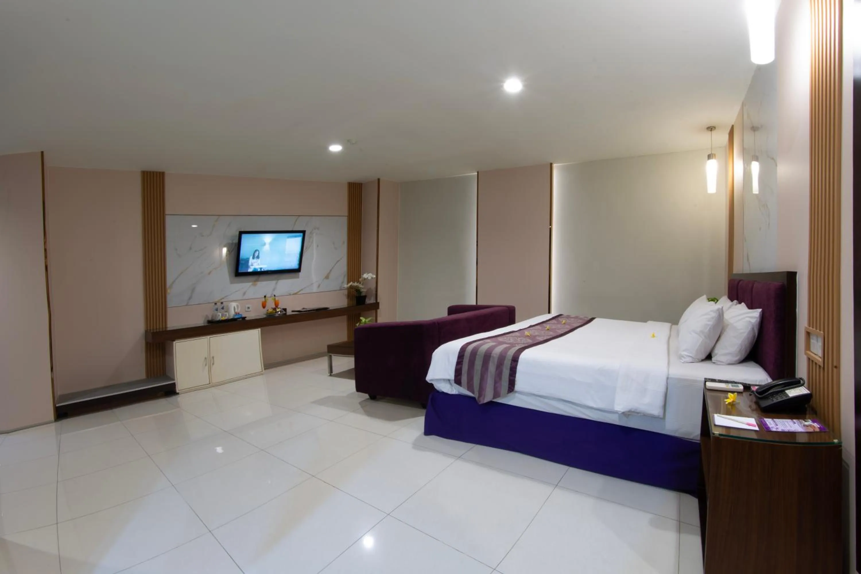 Bed in Lombok Plaza Hotel and Convention