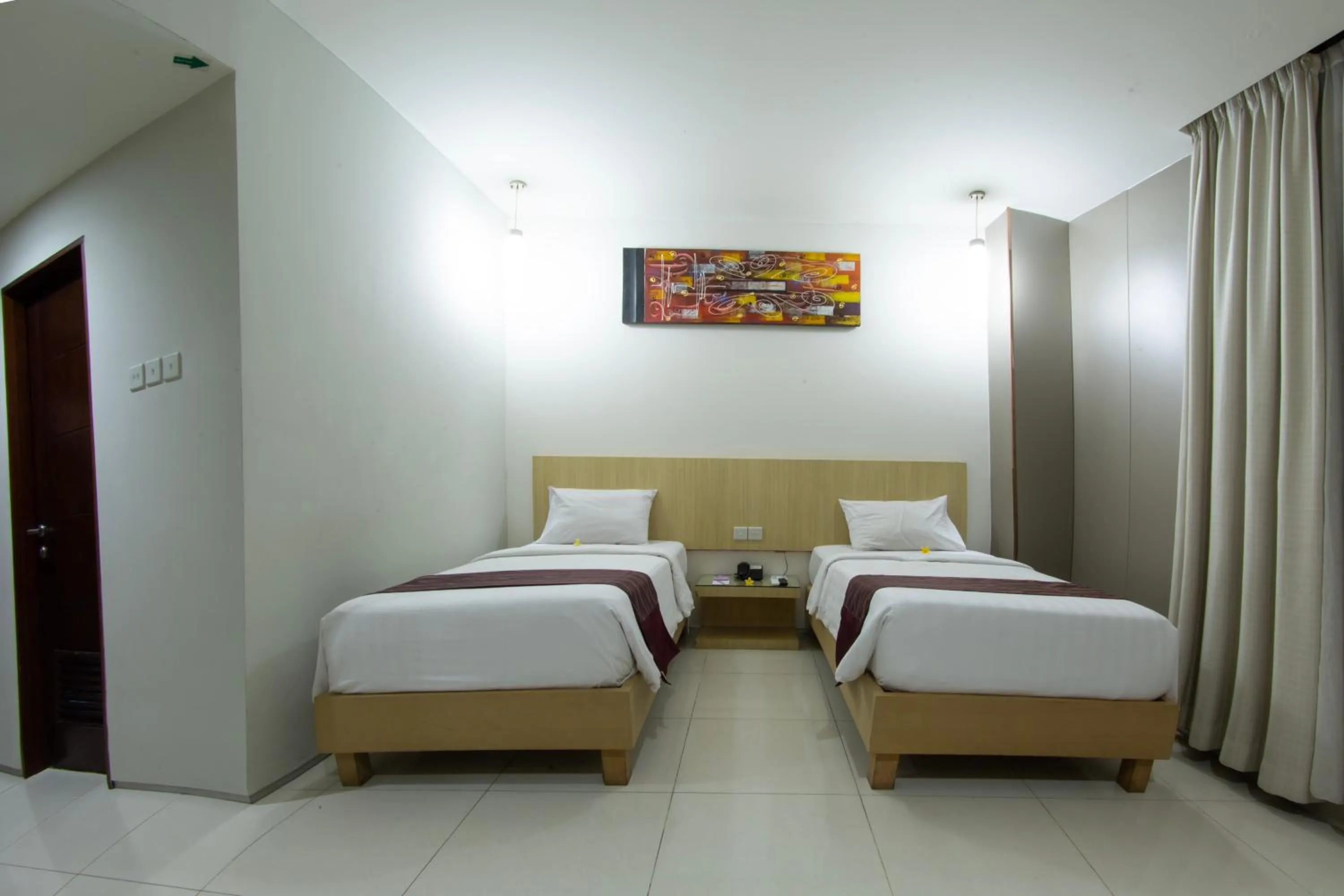Bed in Lombok Plaza Hotel and Convention