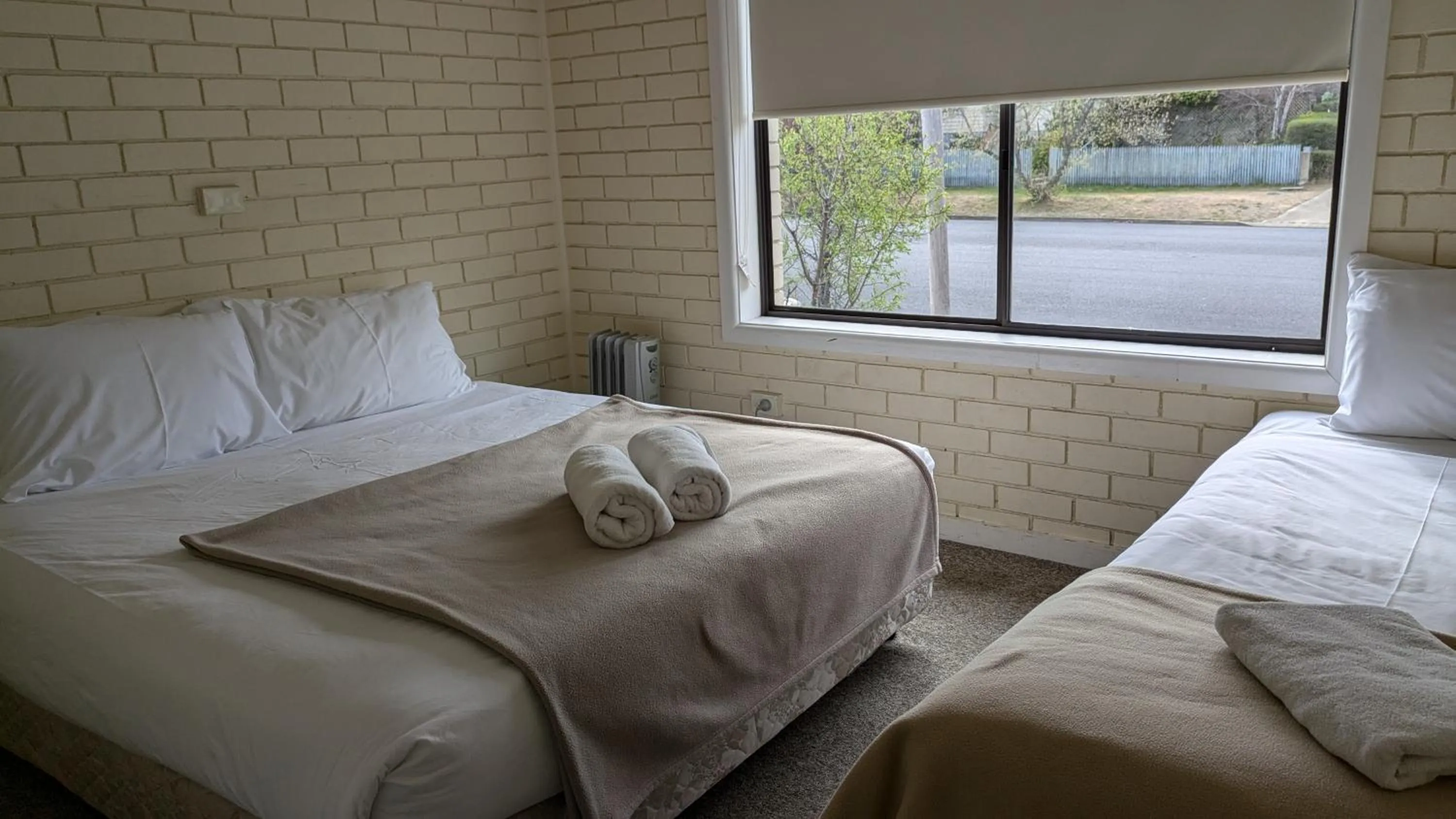 Bed in The Swiss Motel