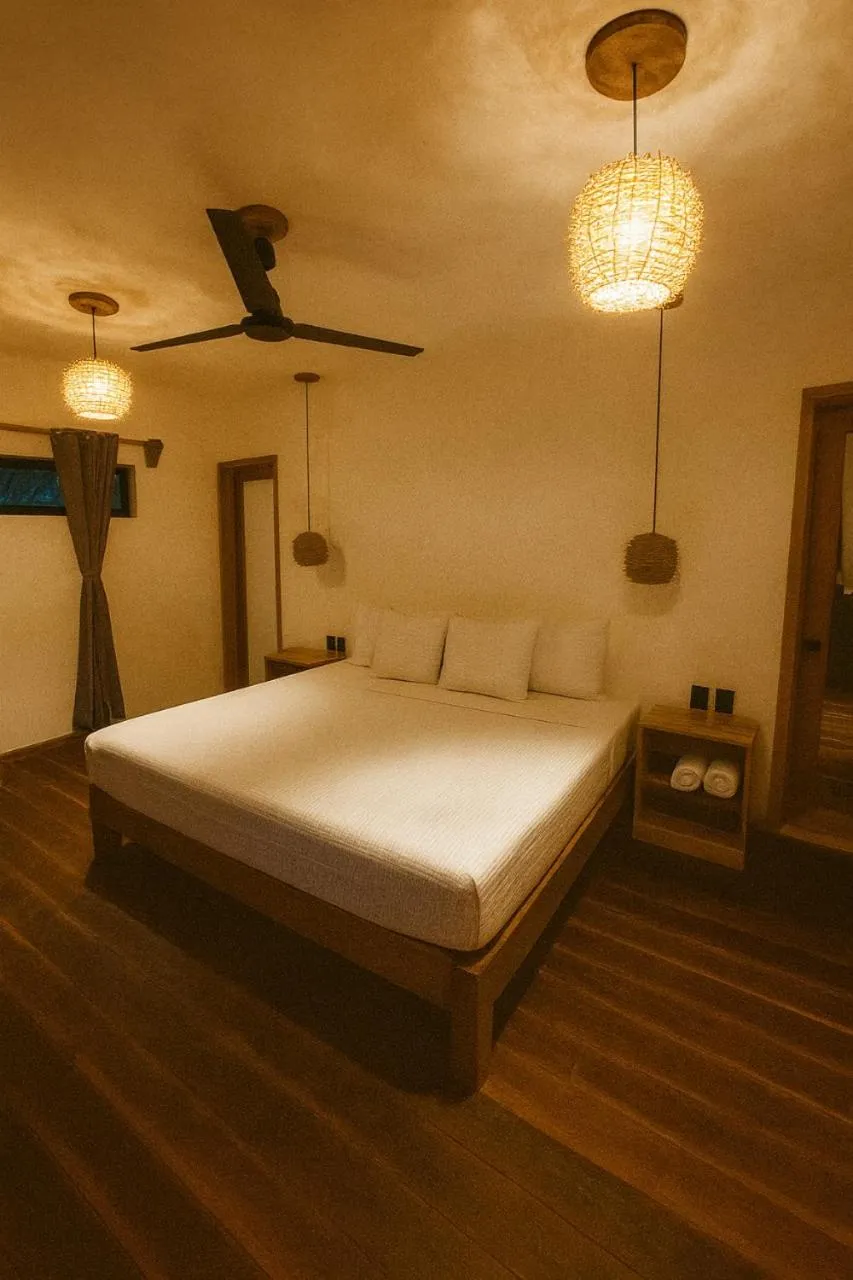 Bed in Hotel Isabella Bacalar Lake Front