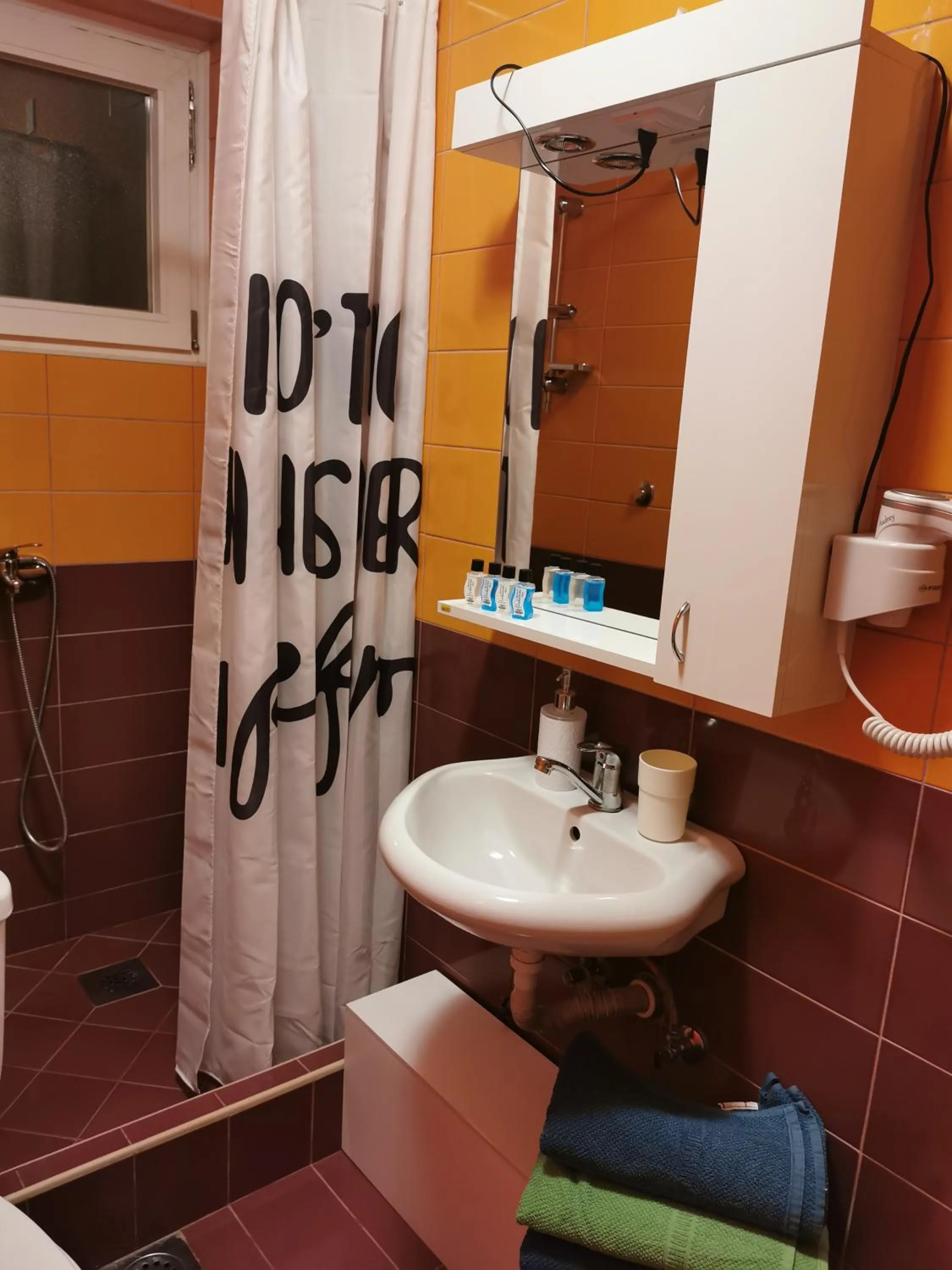 Bathroom in Lukanov Apartments & Guest Rooms