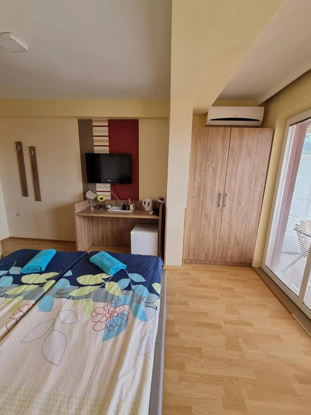 Bed in Lukanov Apartments & Guest Rooms