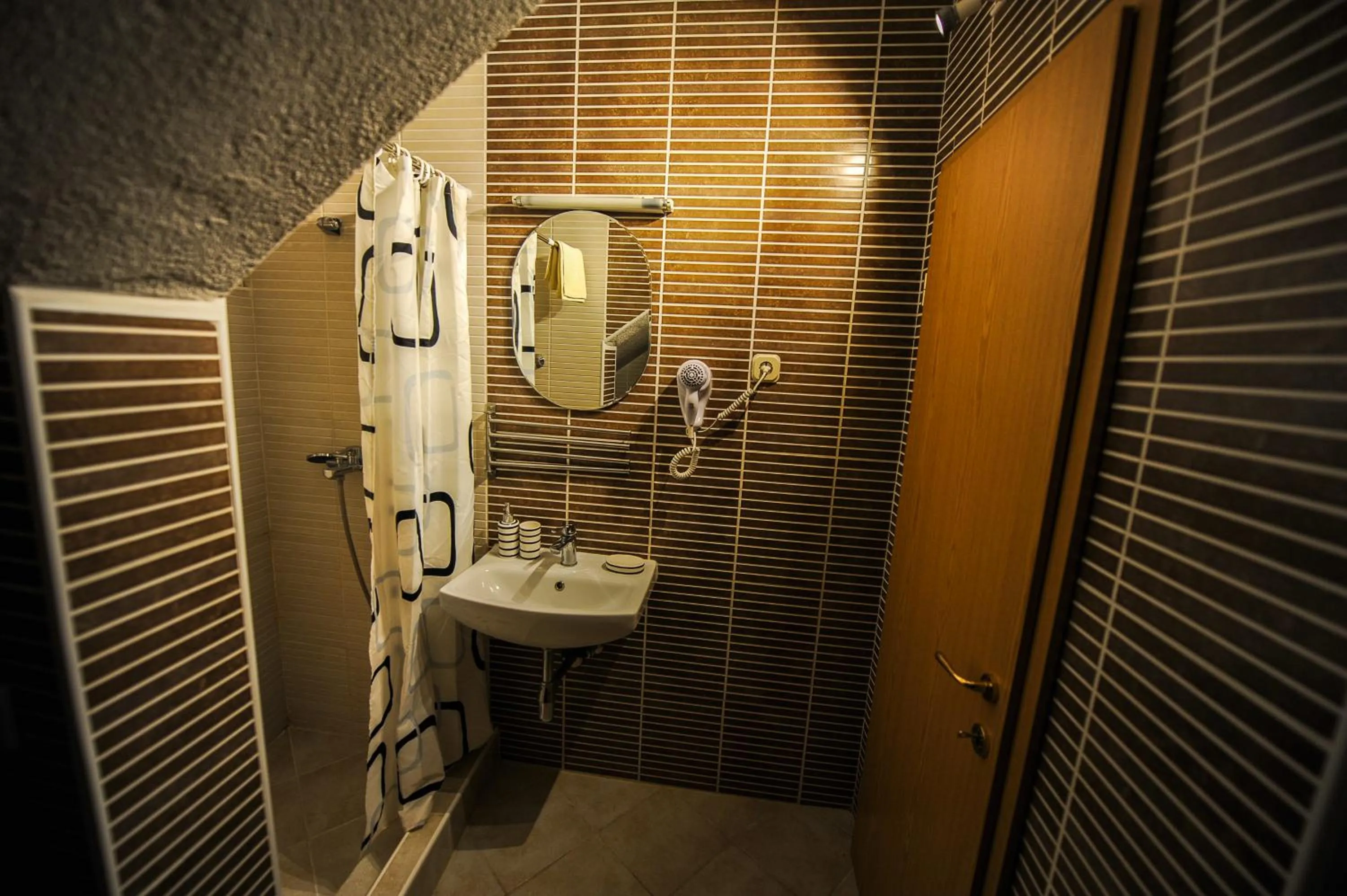 Bathroom in Lukanov Apartments & Guest Rooms