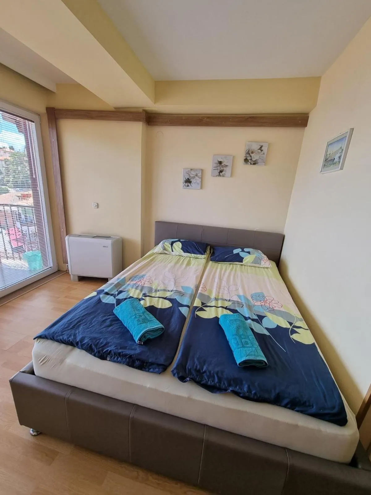 Bed in Lukanov Apartments & Guest Rooms