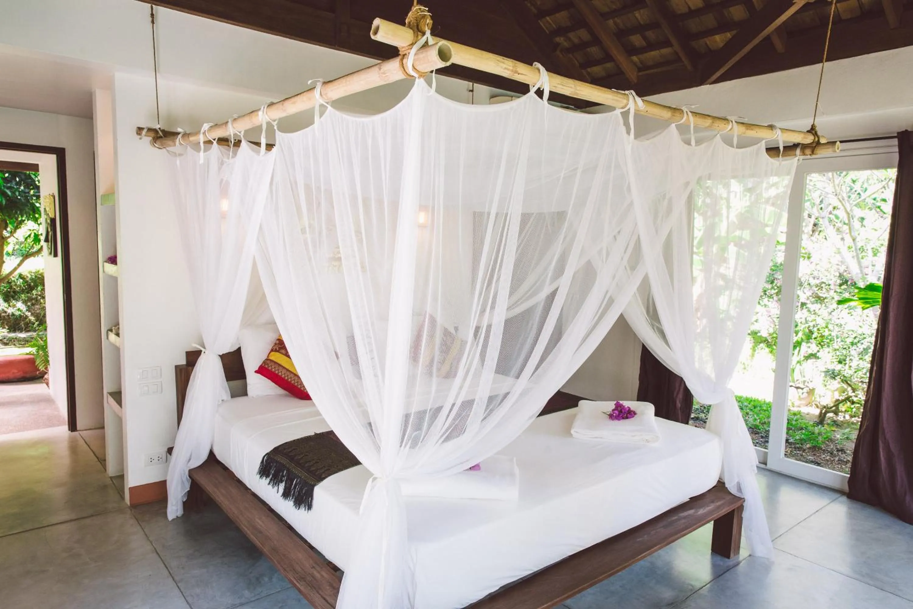 Bed in Koyao Bay Pavilions - Beach Resort and Pool Villas