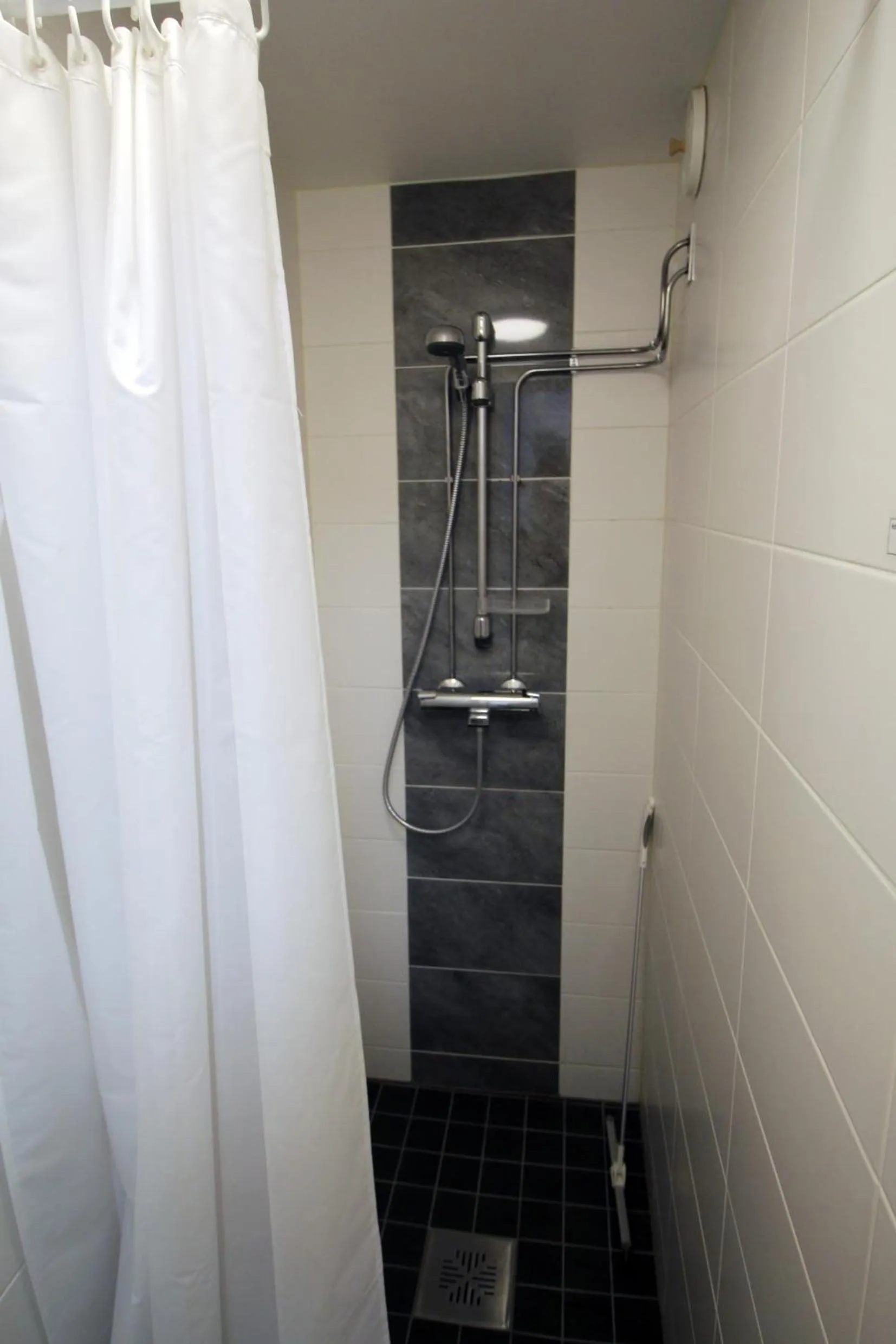 Shower in LAURI Historical Log House Manor