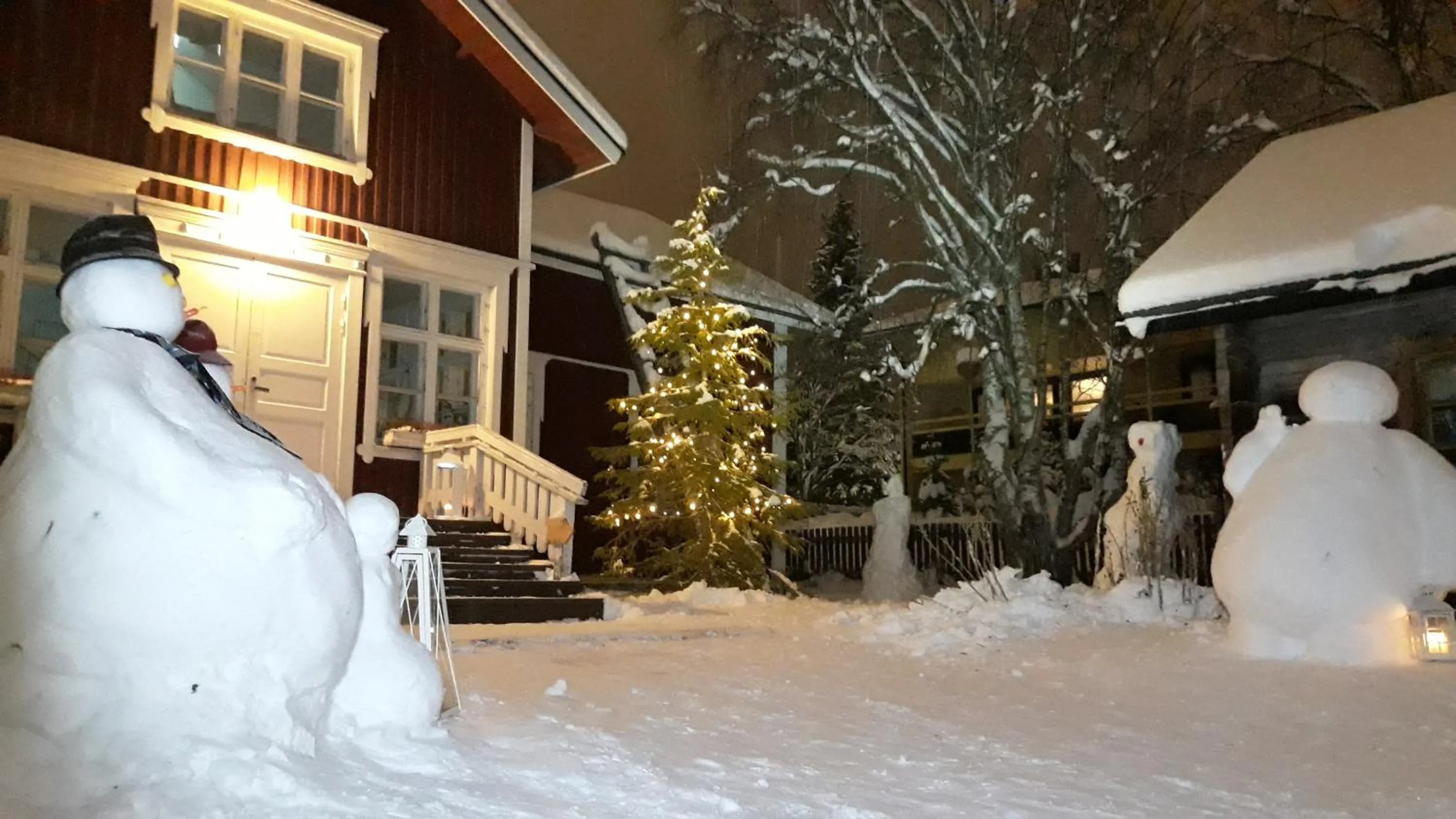 Facade/entrance in LAURI Historical Log House Manor
