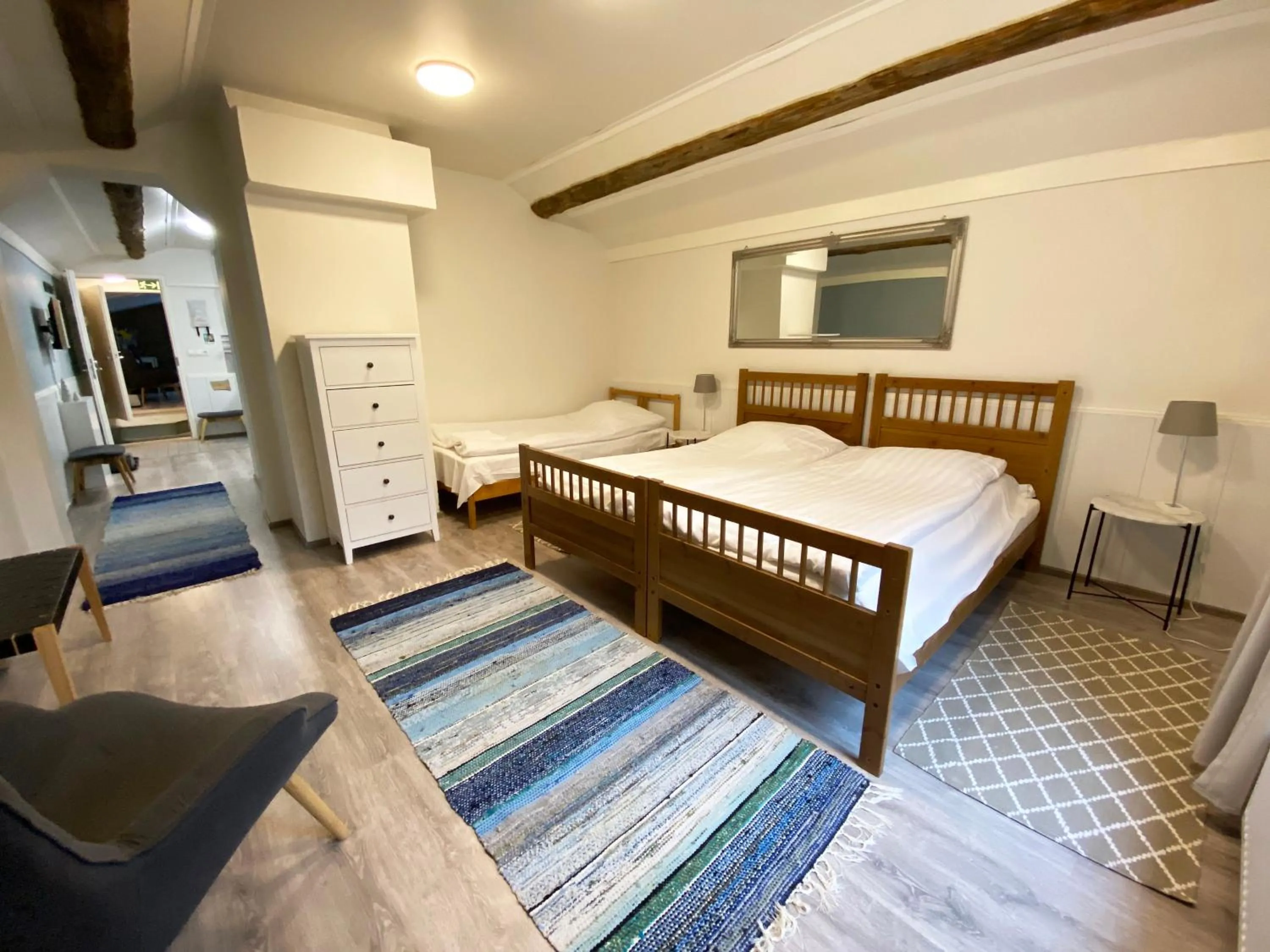 Photo of the whole room, Bed in LAURI Historical Log House Manor