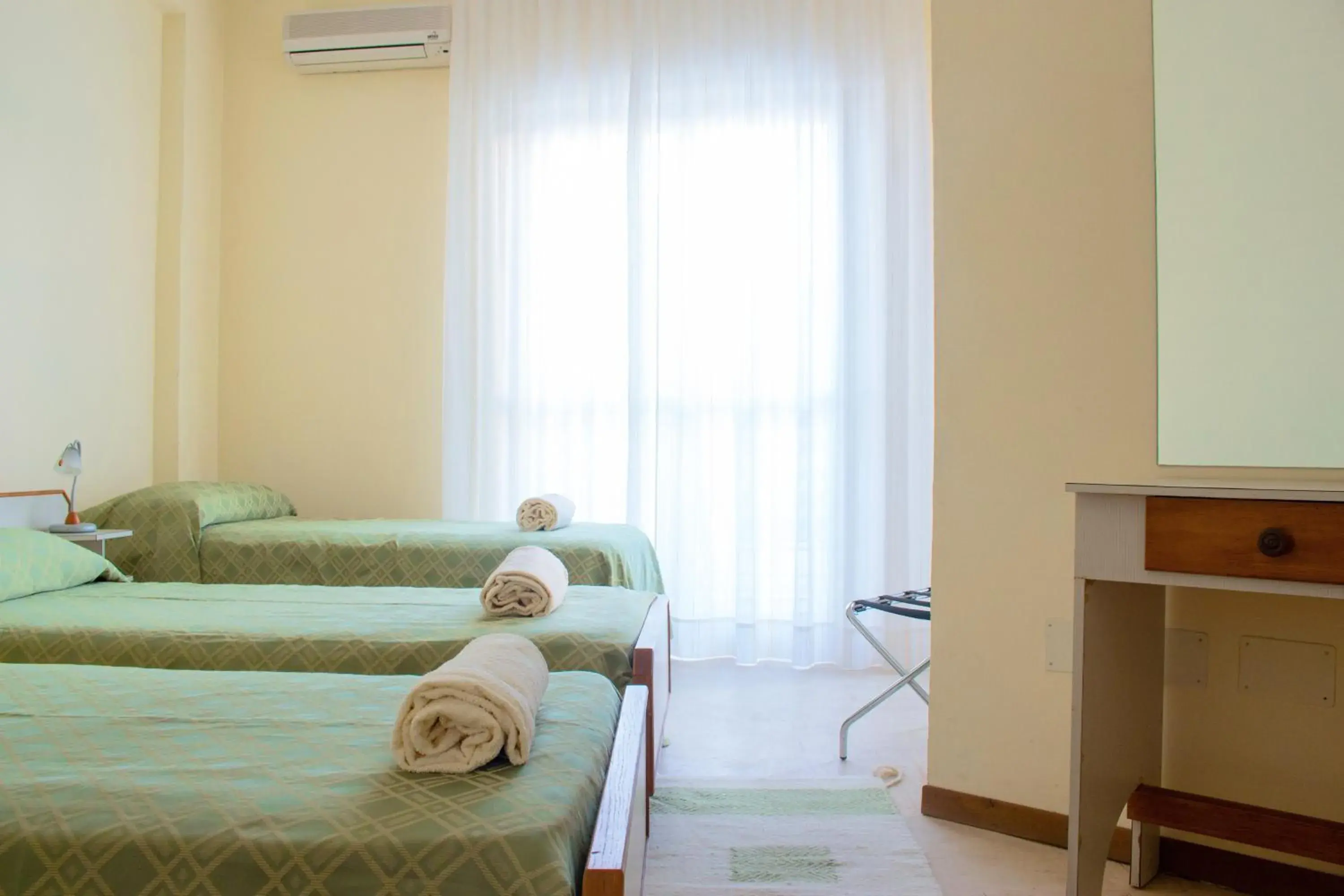 Triple Room in Hotel Il Girasole Triple Room in Hotel Il Girasole