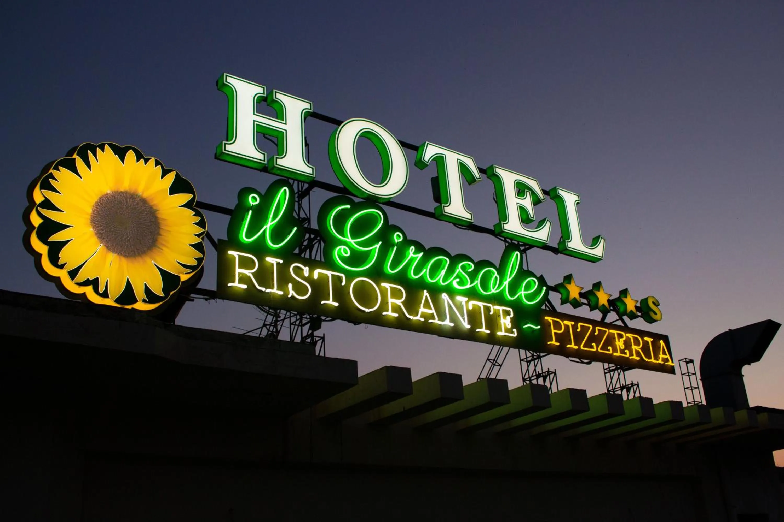 Property logo or sign in Hotel Il Girasole