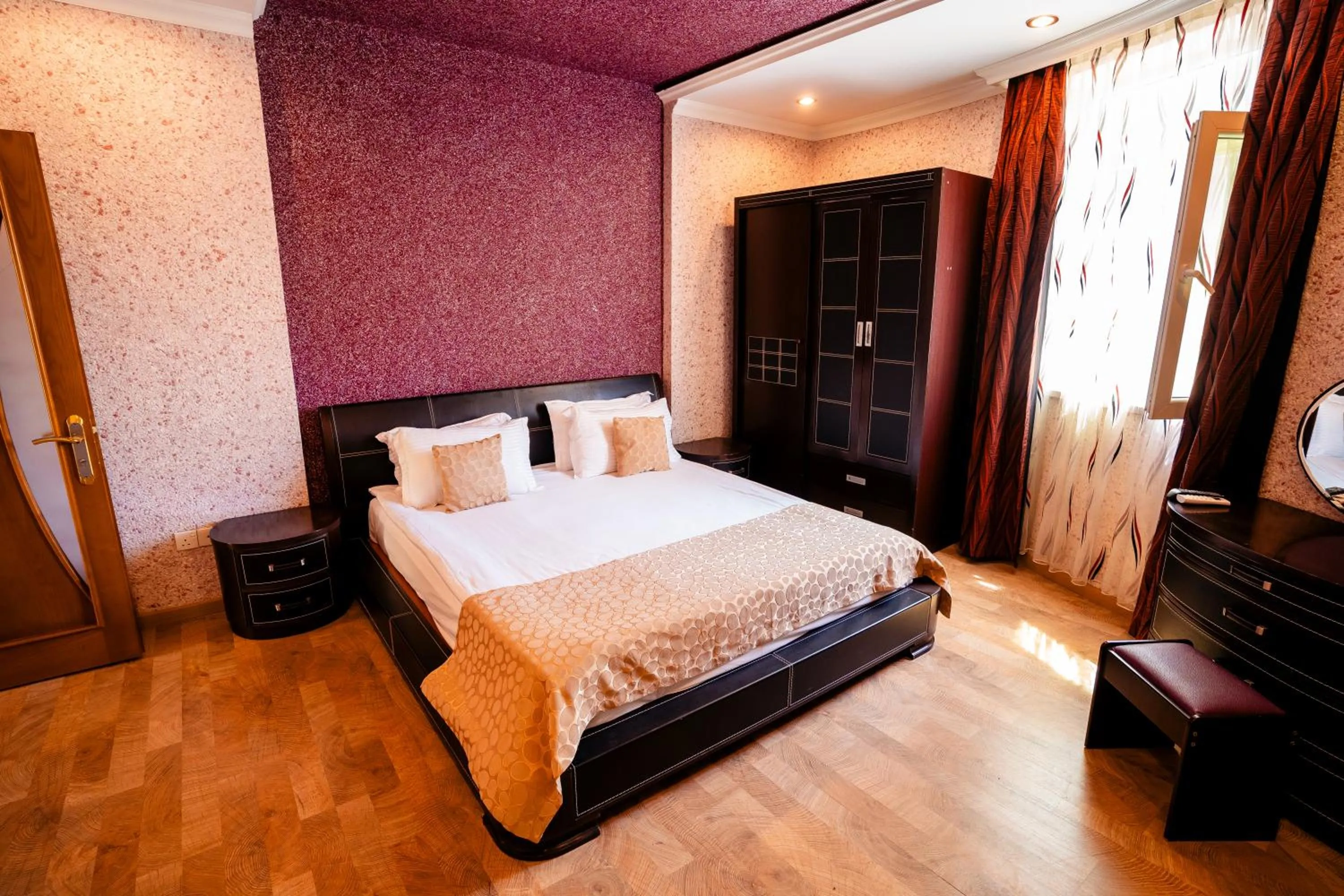 Bed in Panorama Villa Lux Hotel