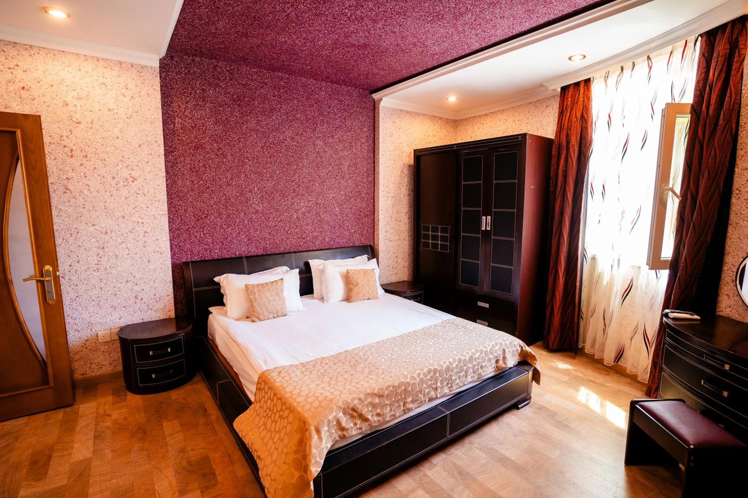 Bed in Panorama Villa Lux Hotel