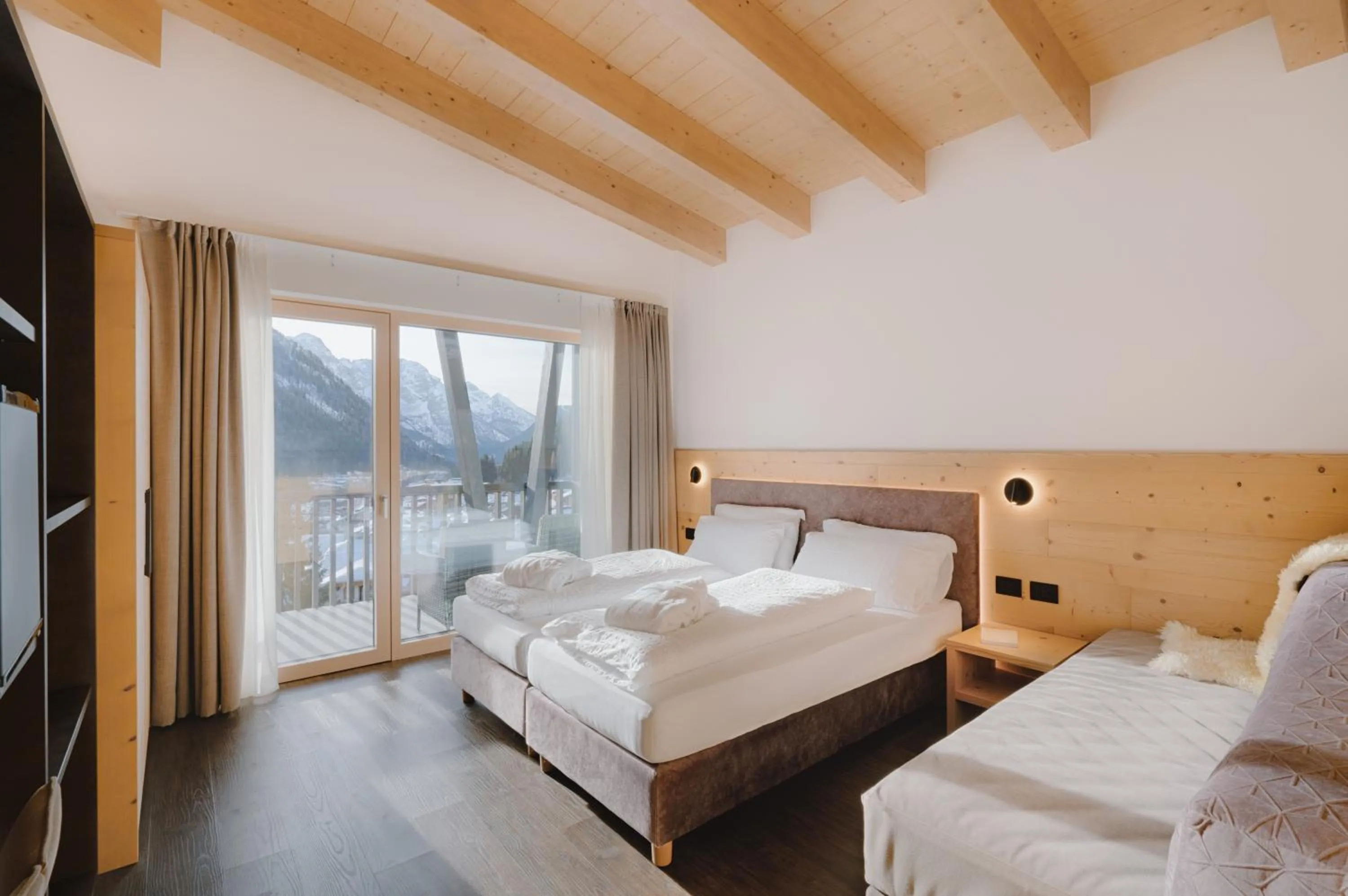 Bed in Alpen Hotel Vidi