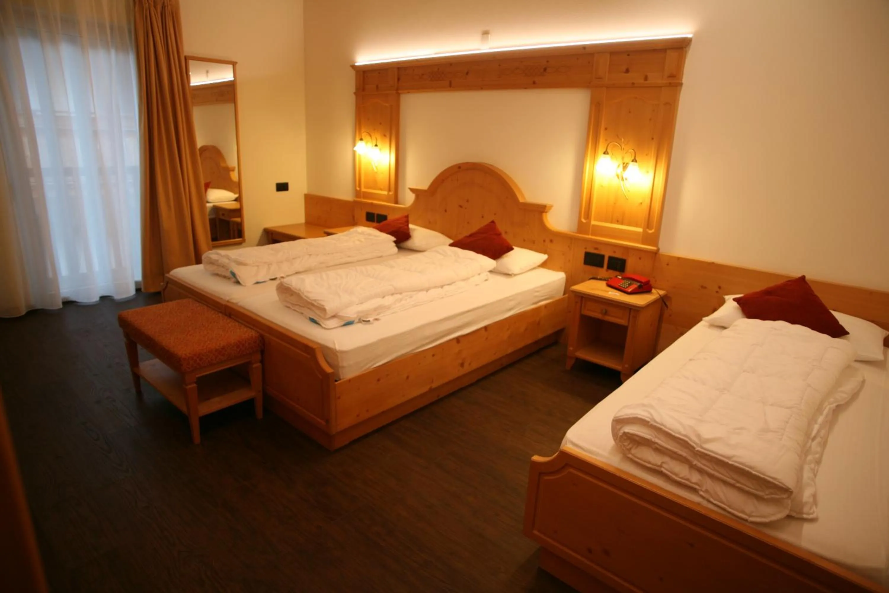 Bed in Alpen Hotel Vidi